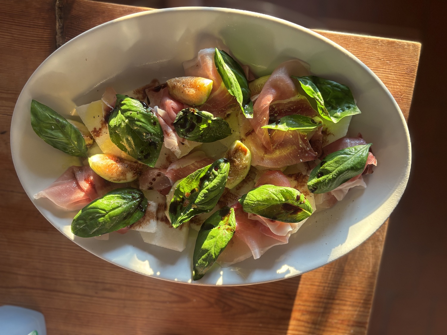 Fresh fruits like melon and figs and cured meats like proscuitto are common at restaurants on the Calabrian coast.