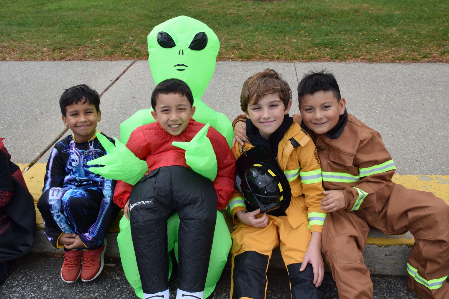 Dressed as princesses, superheroes and spooky characters, Hampton Bays Elementary School students paraded around the school’s bus loop on October 31 for the school’s annual Harvest Parade. The smiling teachers and students marched and waved to the crowd of cheering onlookers as the sounds of traditional Halloween music played in the background. COURTESY HAMPTON BAYS SCHOOL DISTRICT