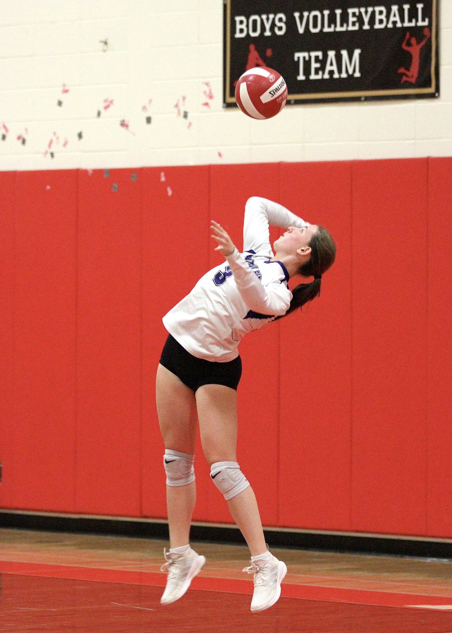 Senior libero Lilly Maffia serves. DESIRÉE KEEGAN