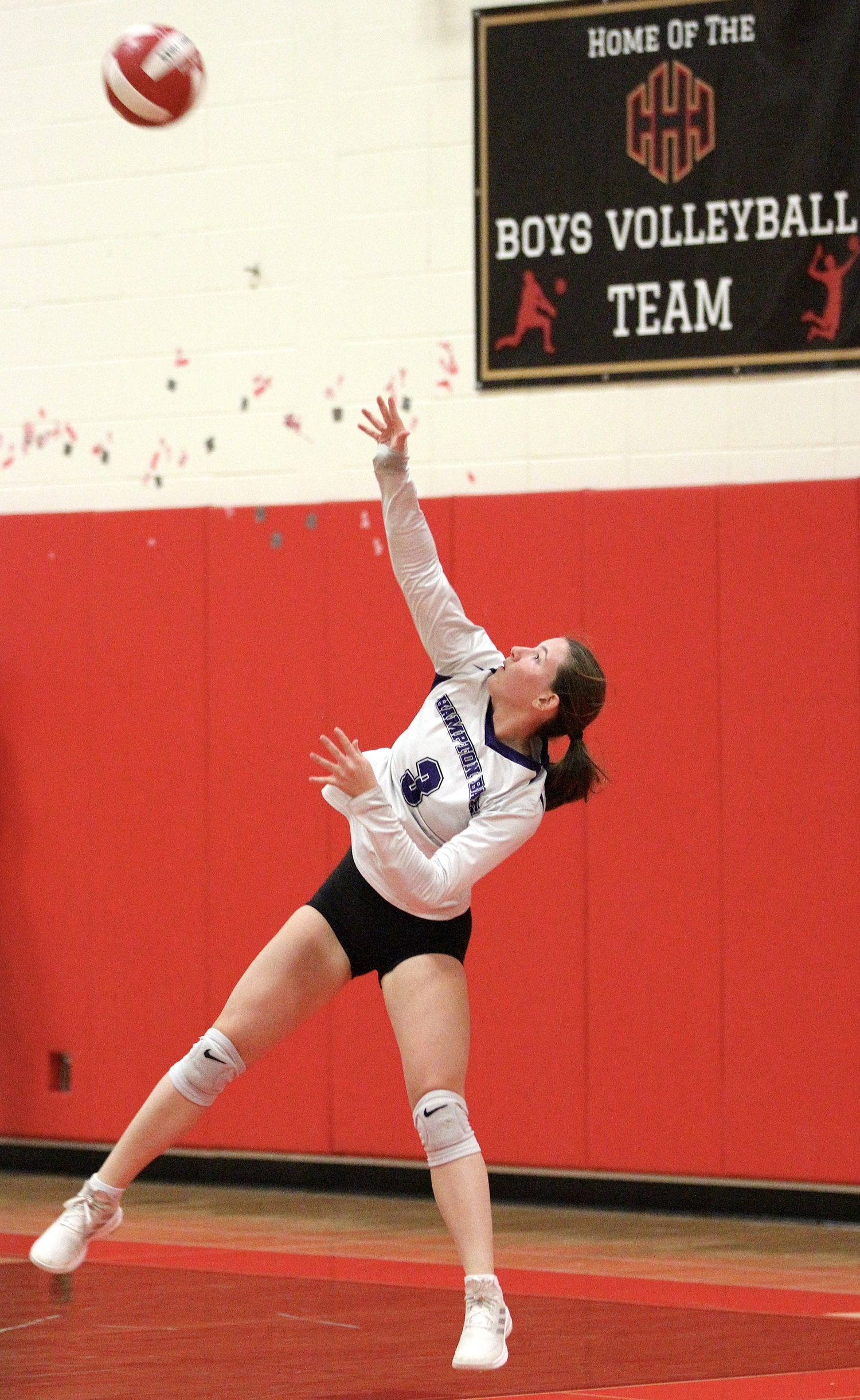 Senior libero Lilly Maffia serves. DESIRÉE KEEGAN