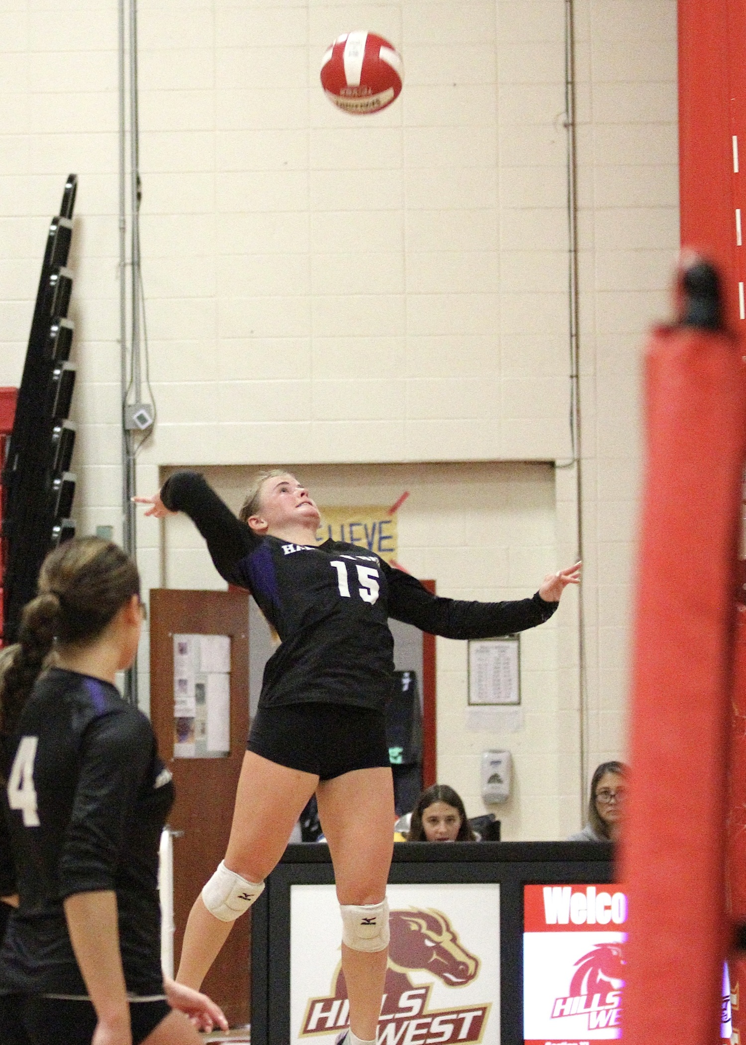 Senior outside hitter Taylor Meyers leaps to the ball for a kill. DESIRÉE KEEGAN