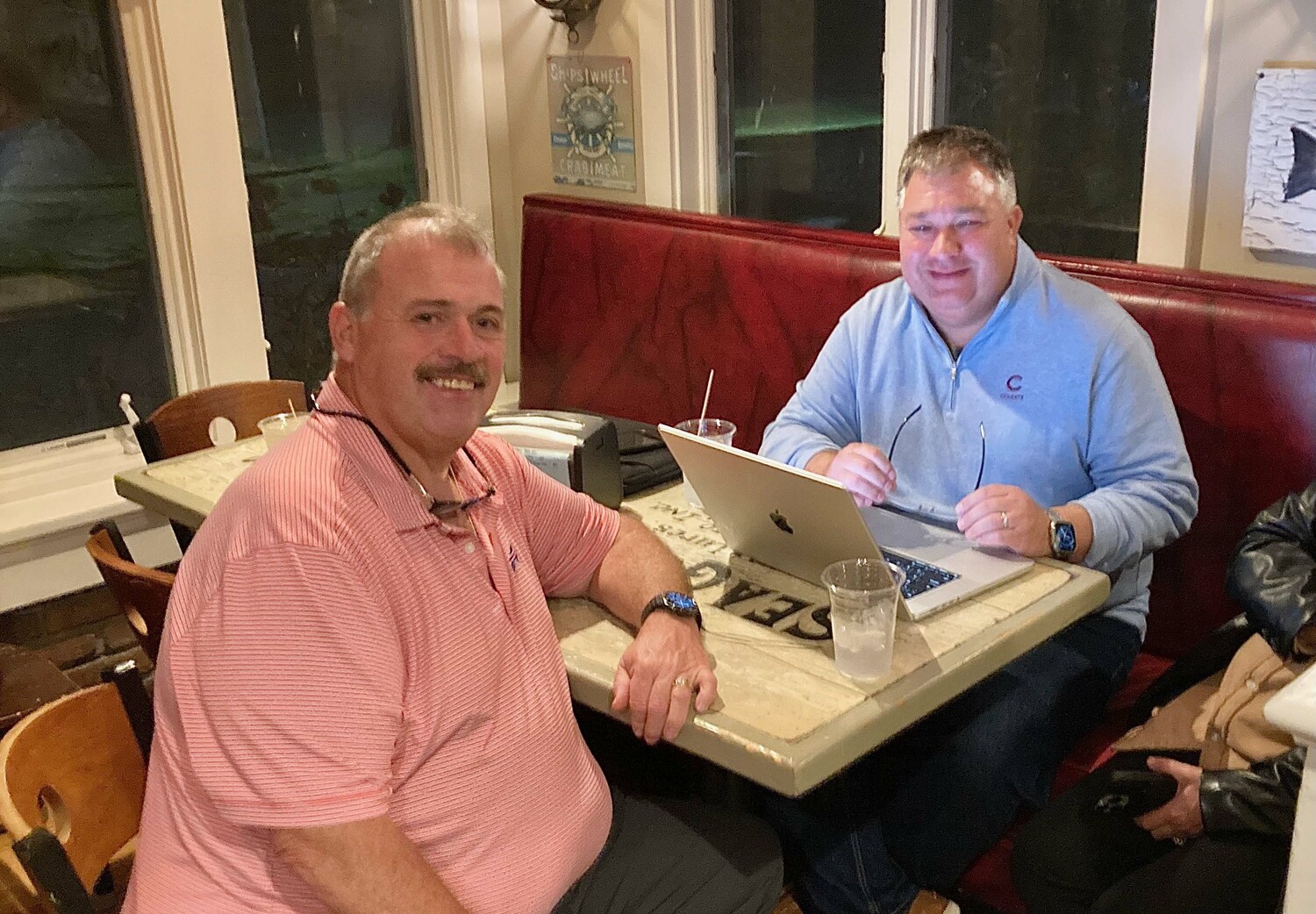 Town Clerk and Town Board candidates Jeff Miller, left, and J.P. Foster, right, at Bostwick's on election night. KYRIL BROMLEY
