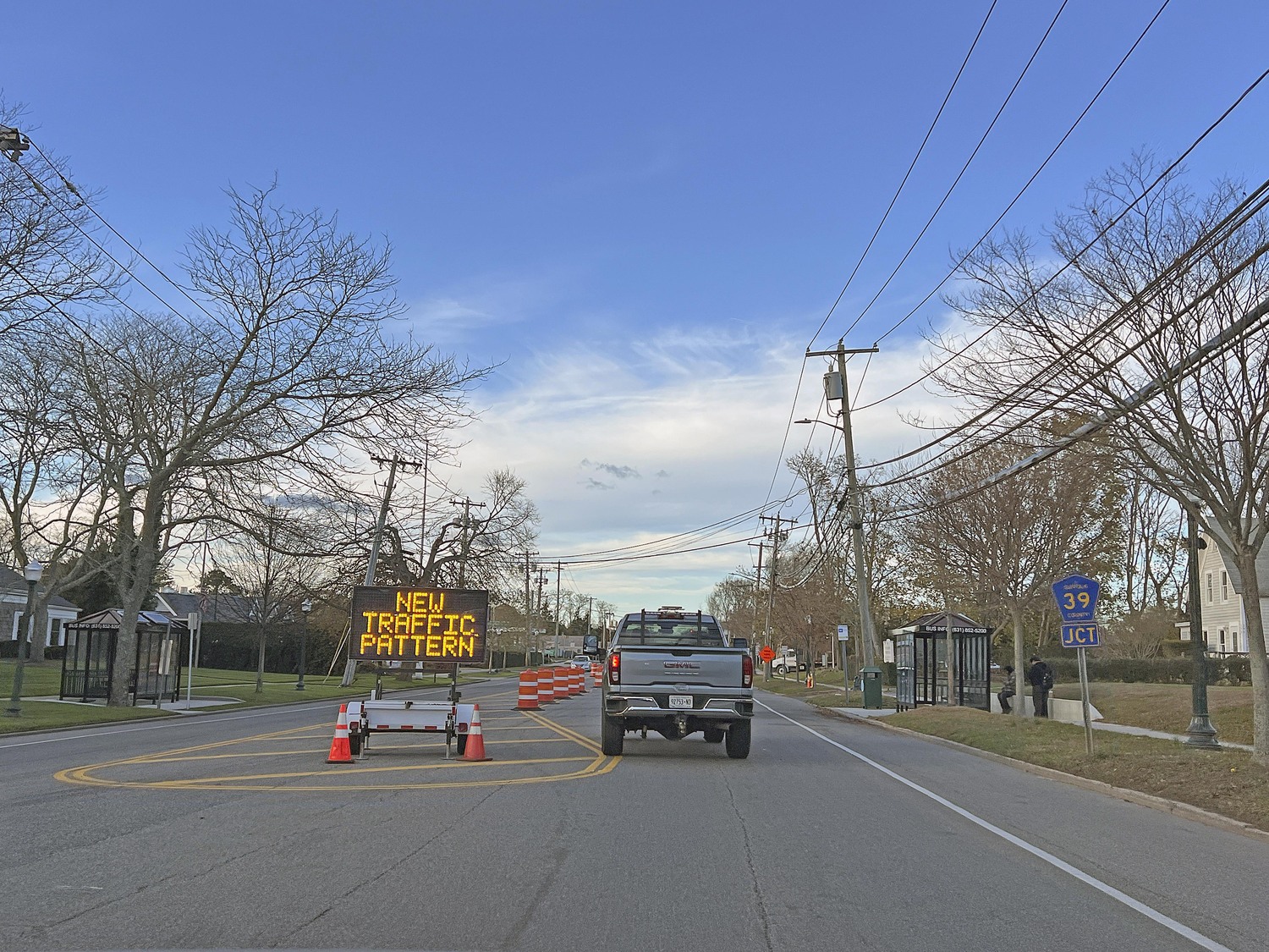 New traffic patterns on County Road 39 force cars to merge to one lane west of North Sea Road so that cars from Sandy Hollow Road can enter the roadway without a third red cycle to the traffic signal.  DANA SHAW