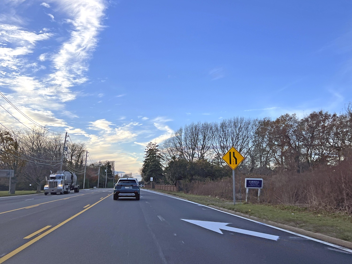New traffic patterns on County Road 39 force cars to merge to one lane west of North Sea Road so that cars from Sandy Hollow Road can enter the roadway without a third red cycle to the traffic signal.  DANA SHAW