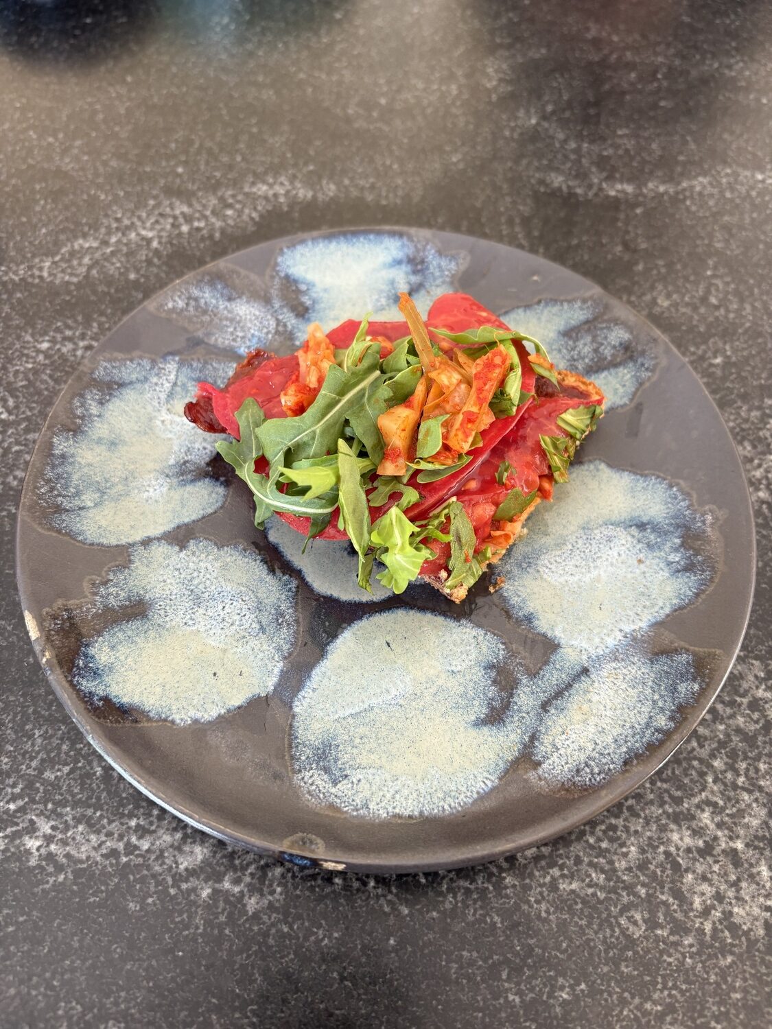 In addition to being a talented chef, Shelley Suh also makes her own pottery, including this plate.