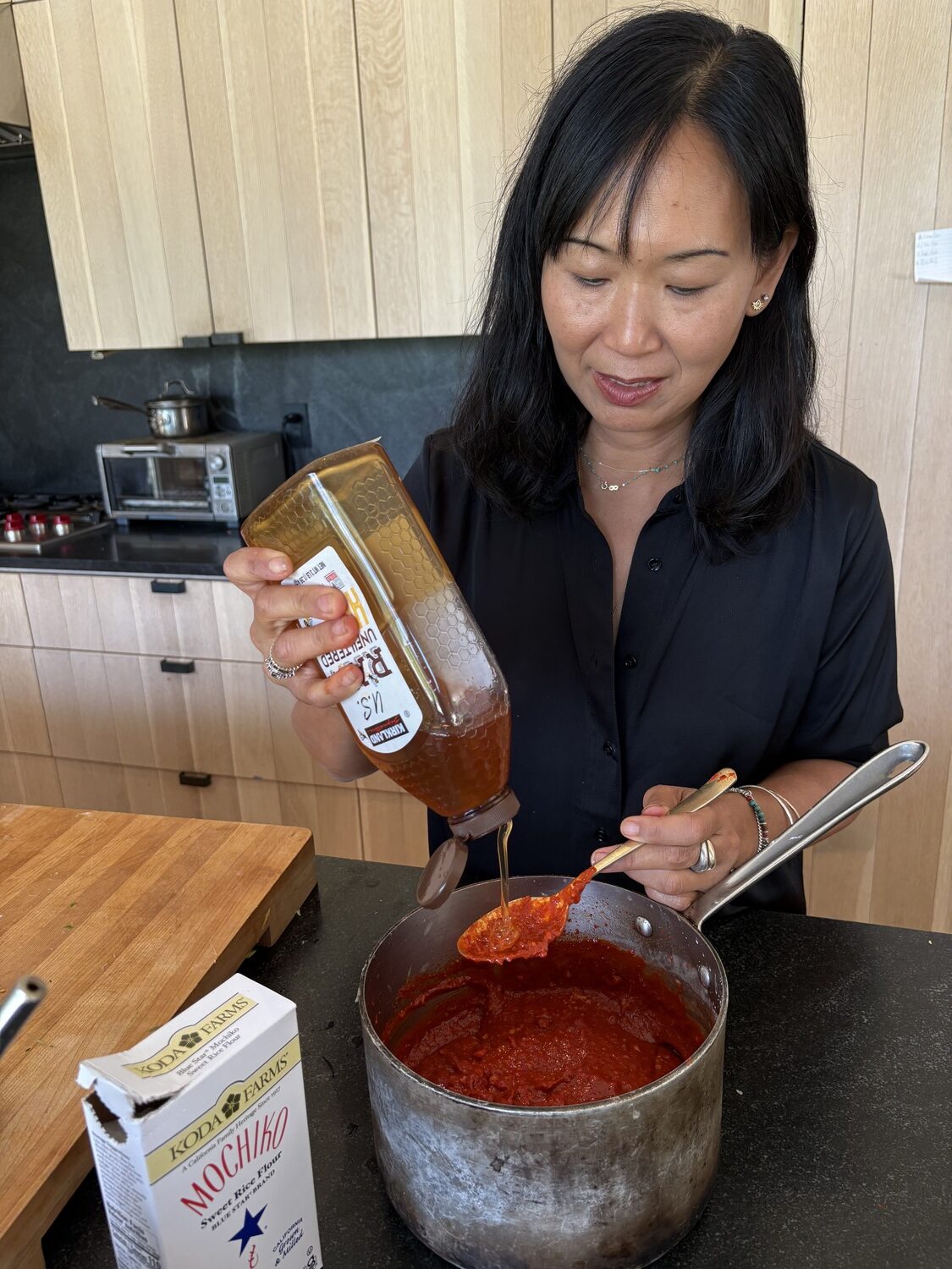 Shelley Suh making a batch of kimchi in her Sagaponack kitchen.