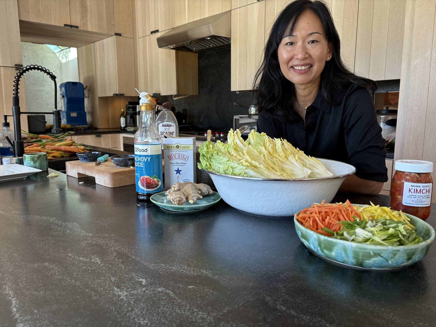 Shelley Suh at her home in Sagaponack. Her homemade kimchi is in high demand, and is currently sold at Marilee's Farmstand and the Sagaponack General Store. She uses vegetables grown at Marilee Foster's Sagaponack farm to make the kimchi. CAILIN RILEY PHOTOS
