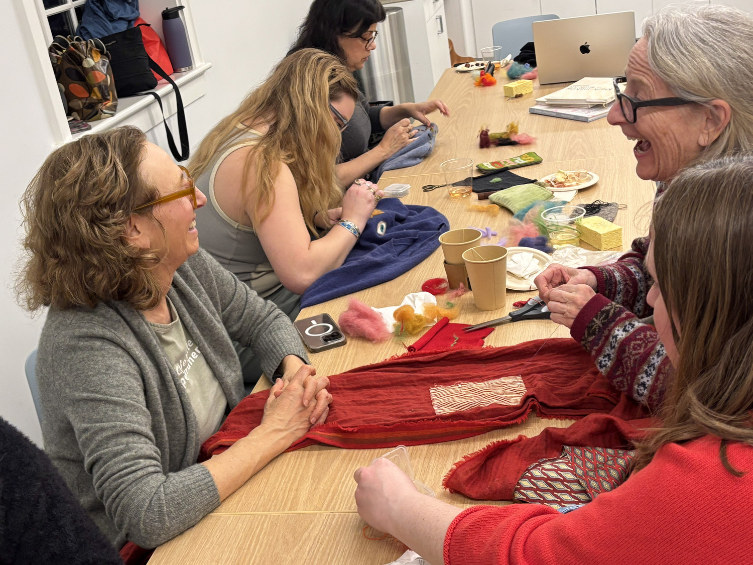 Artist Laurie Lambrecht at Guild Hall's Art Social felting workshop last winter. The celebrated artist returns for a holiday sweater felting workshop on December 15. Photo courtesy of Guild Hall.