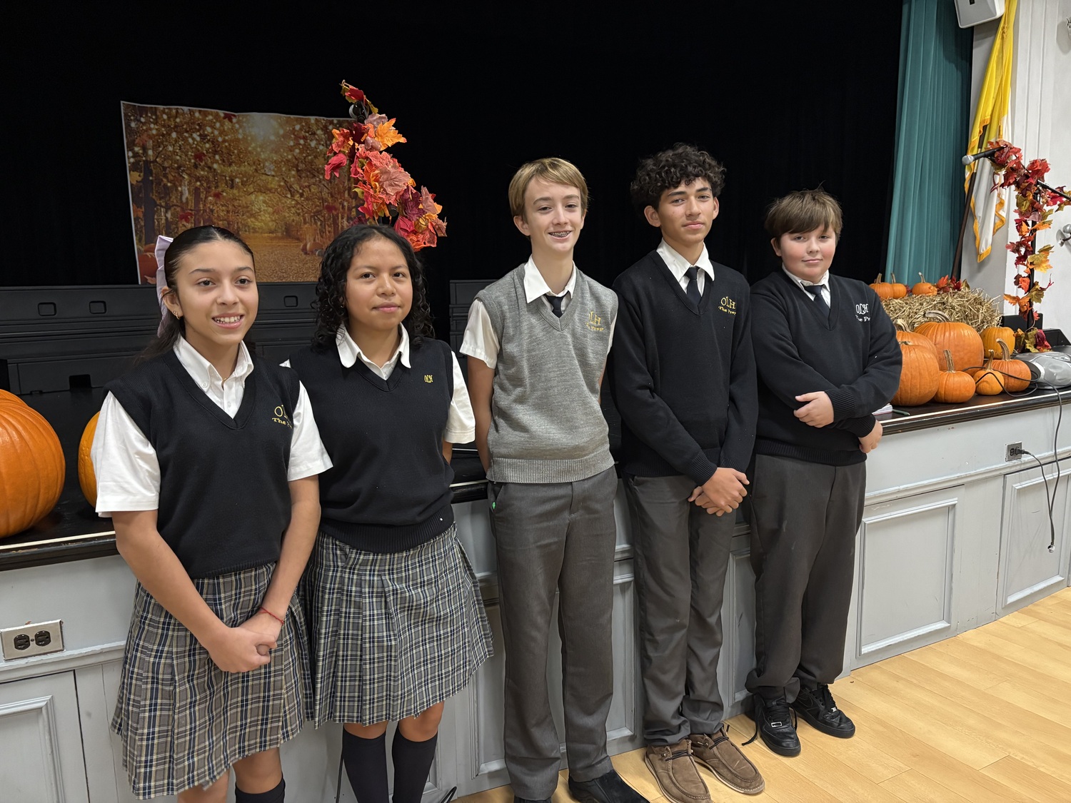 From left, OLH students Nicole Cardona, Sofia Sisalima, Cooper Beaton, Gabriel Torrealba-Koehler, and Parker Saunders. CAILIN RILEY