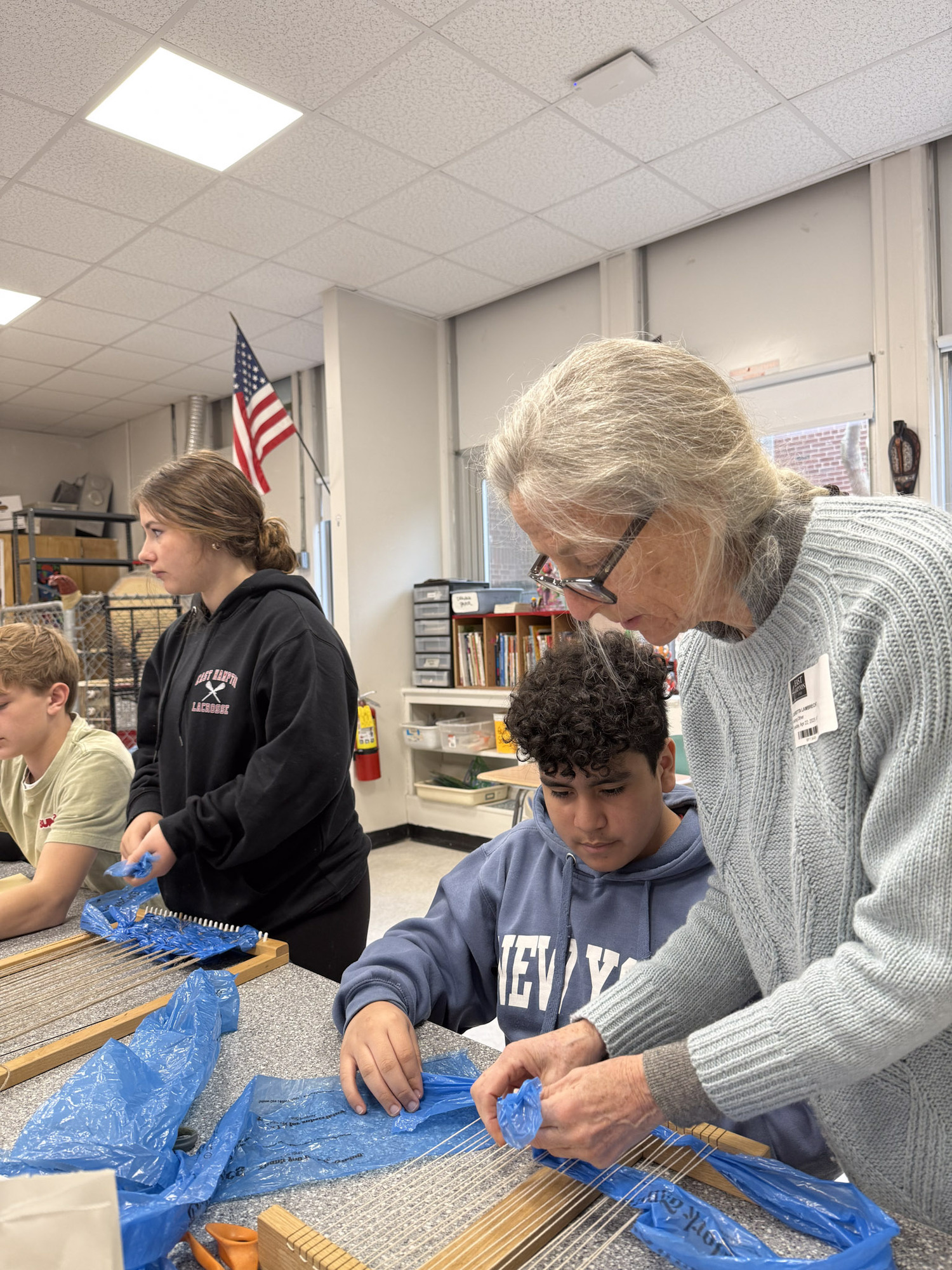 East Hampton Middle School students working with Laurie Lambrecht for the Student Art Festival. KAYLA MATTERS