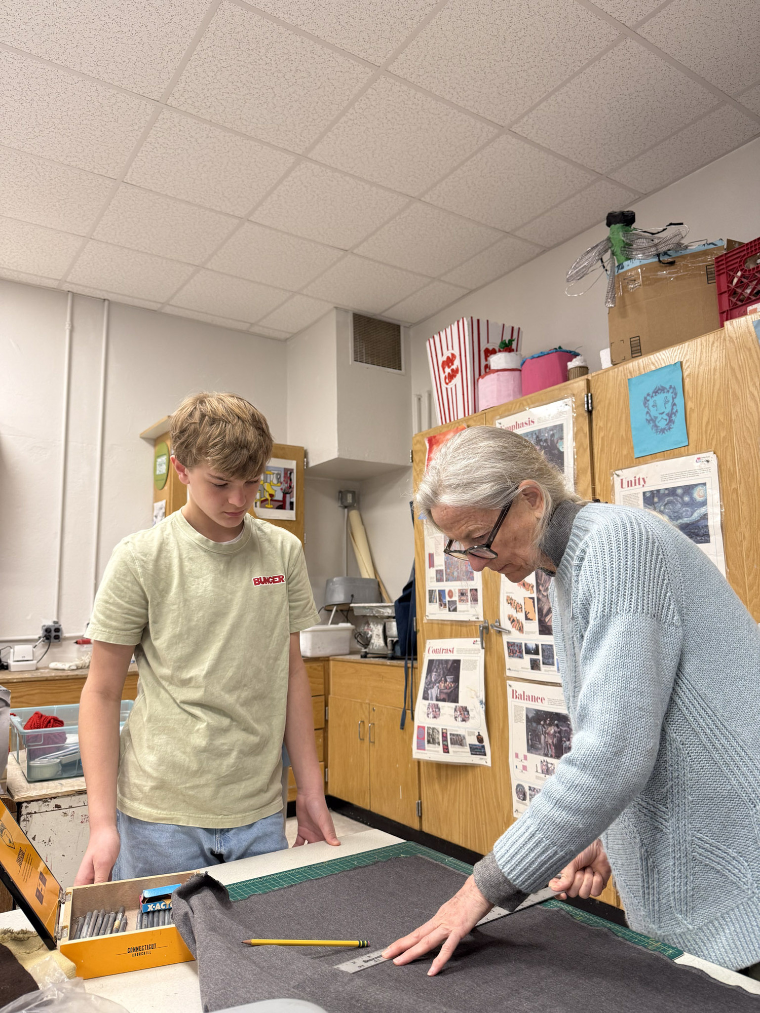 East Hampton Middle School students working with Laurie Lambrecht for the Student Art Festival. KAYLA MATTERS