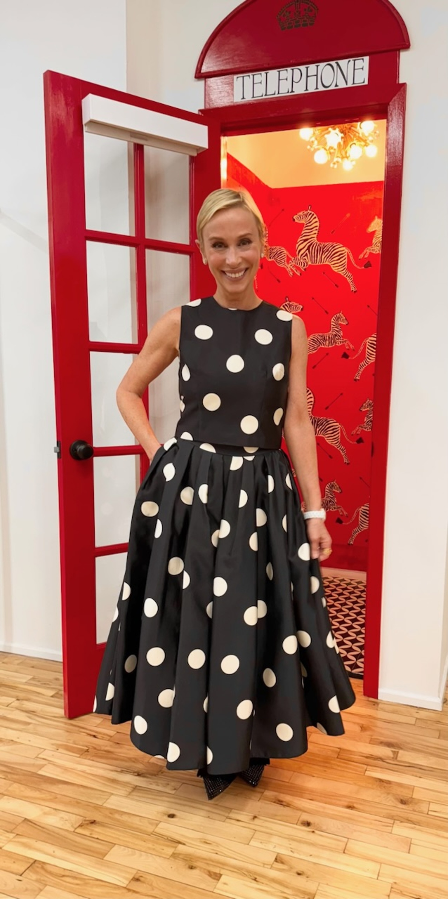 Author Lisa Frohlich in MAE New York polka dot top and skirt.