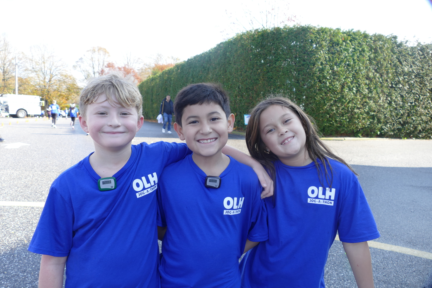 Our Lady of the Hamptons School recently held its  second annual Jog-a-Thon. Students ran and jogged the three-hour course and reached 101 percent of their projected fundraising goal.  From left, Jaxson O'Brien, Matthew Vaca and Parissa Weglein after the race. COURTESY OUR LADY OF THE HAMPTONS SCHOOL