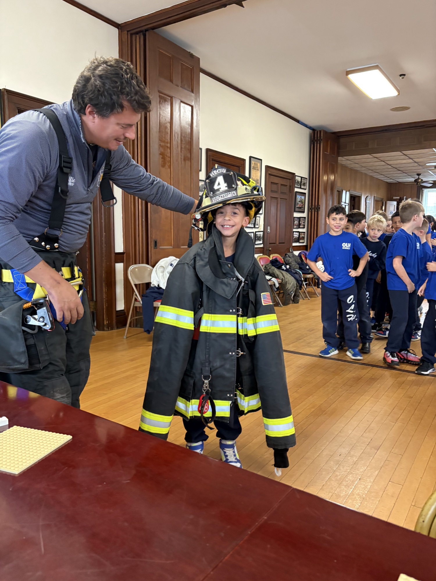 Our Lady of the Hamptons School students in Bonnie Spellman's third-grade students had a hands-on experience at the Southampton Fire Department and Ambulance Squad. Hosted by former chief Alfred Callahan (the father of four OLH students) the 34 students learned in depth about the workings of volunteer first responders. COURTESY OUR LADY OF THE HAMPTONS SCHOOL