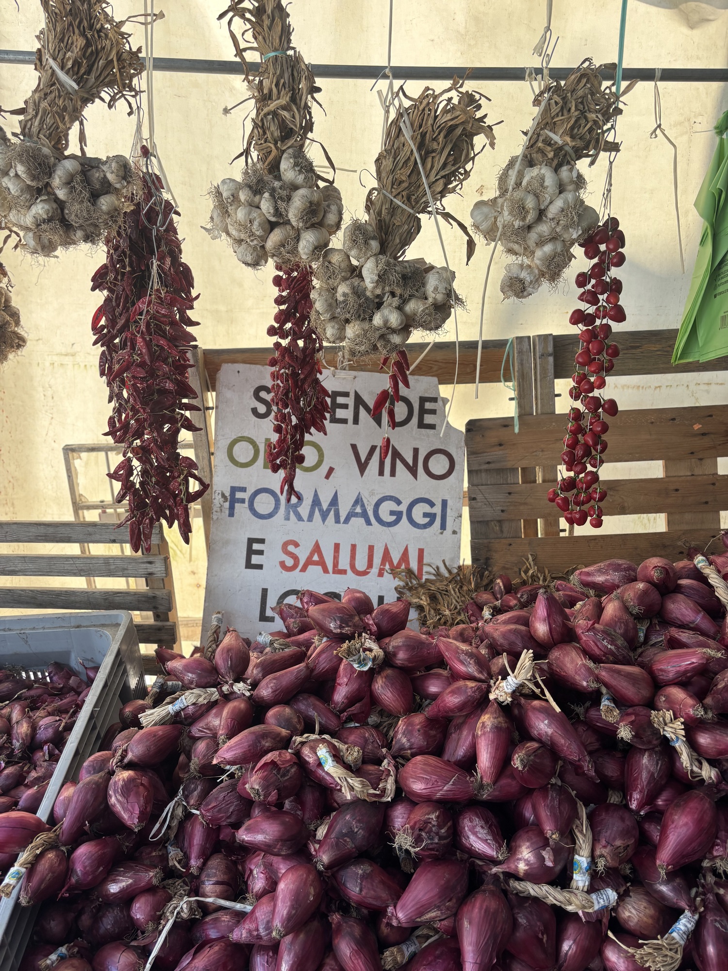 Tropea is known for their candy-sweet red onions, and each vendor sells them in long and braided cords. Hannah Selinger photo