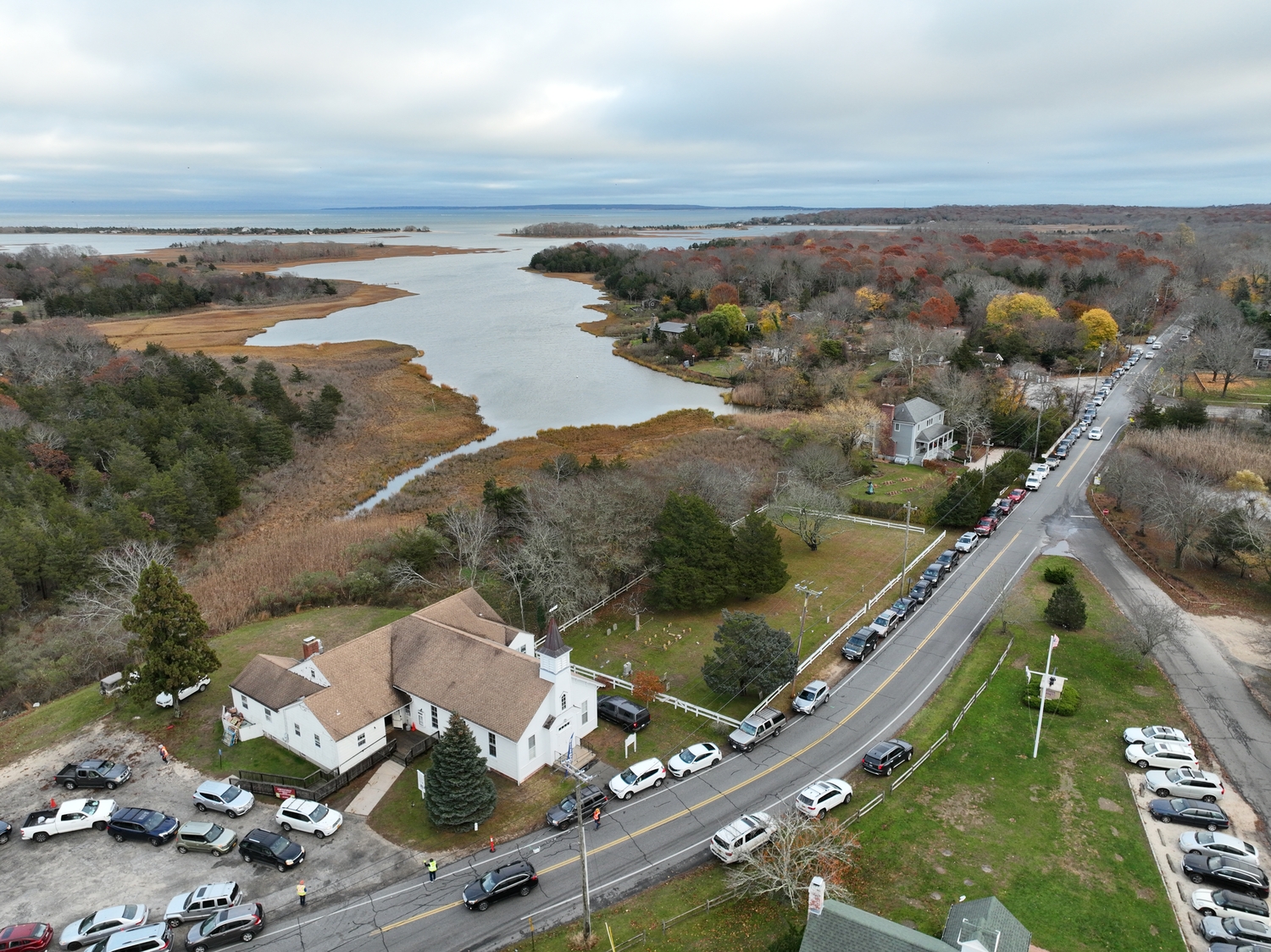 Cars line up on a Wednesday outside Springs Community Presbyterian Church. BILL DELANO