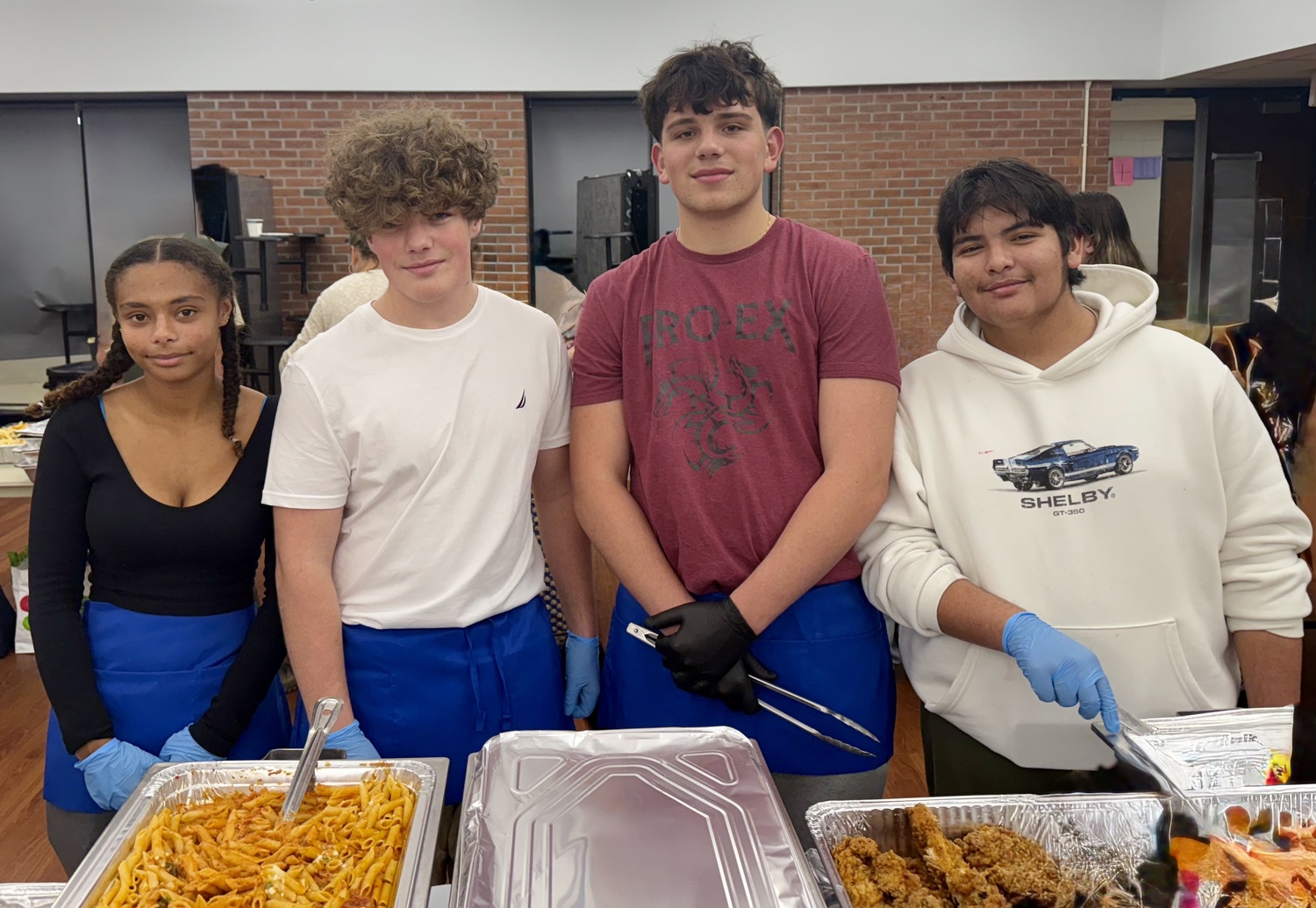 Southampton High School’s Mariners Patriot Club recently hosted its annual appreciation dinner for local veterans. From left, students Hailey  Sulph, Luke Schmidt, Kevin Viviance and Demetrios Lazarakis. COURTESY SOUTHAMPTON SCHOOL DISTRICT