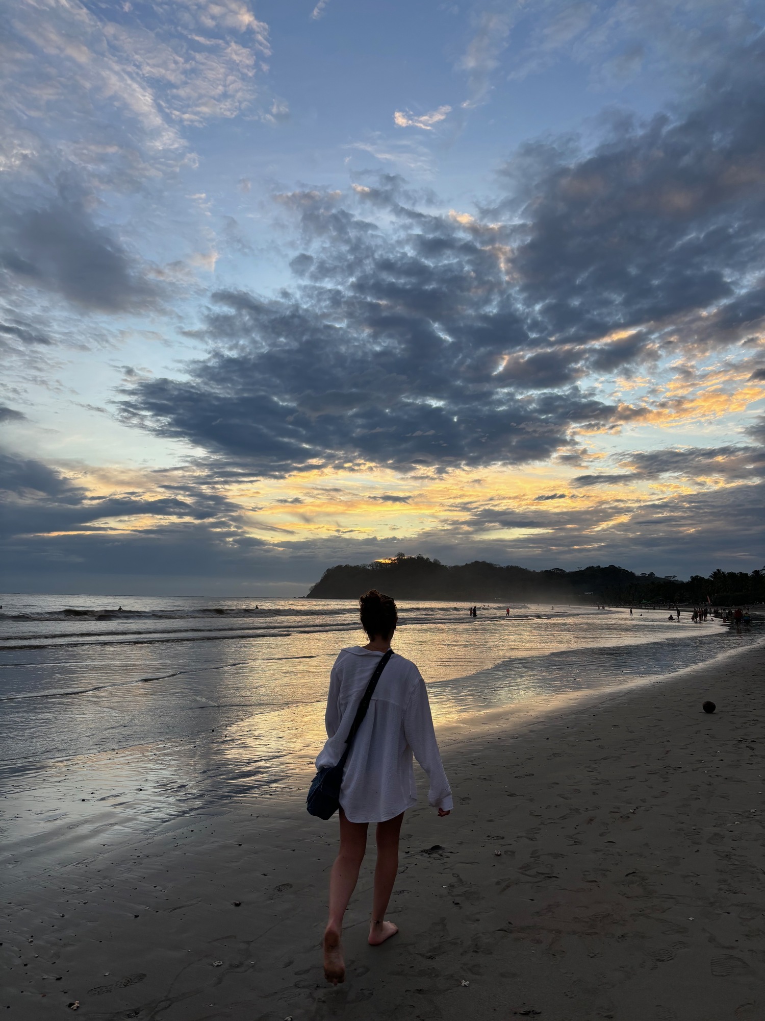 The author enjoys a walk, beachside.