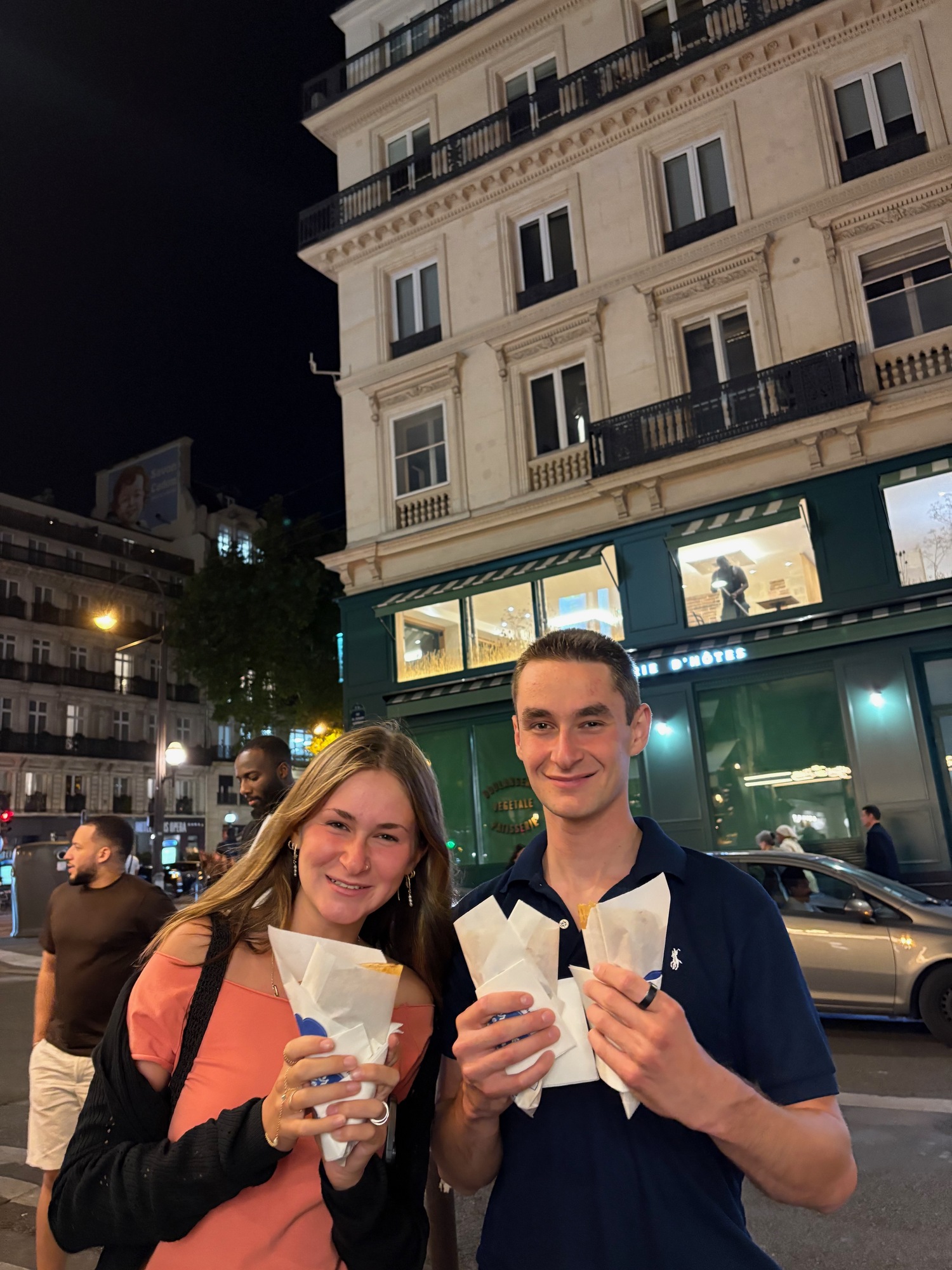 The author's children enjoying the foods that Paris has to offer.