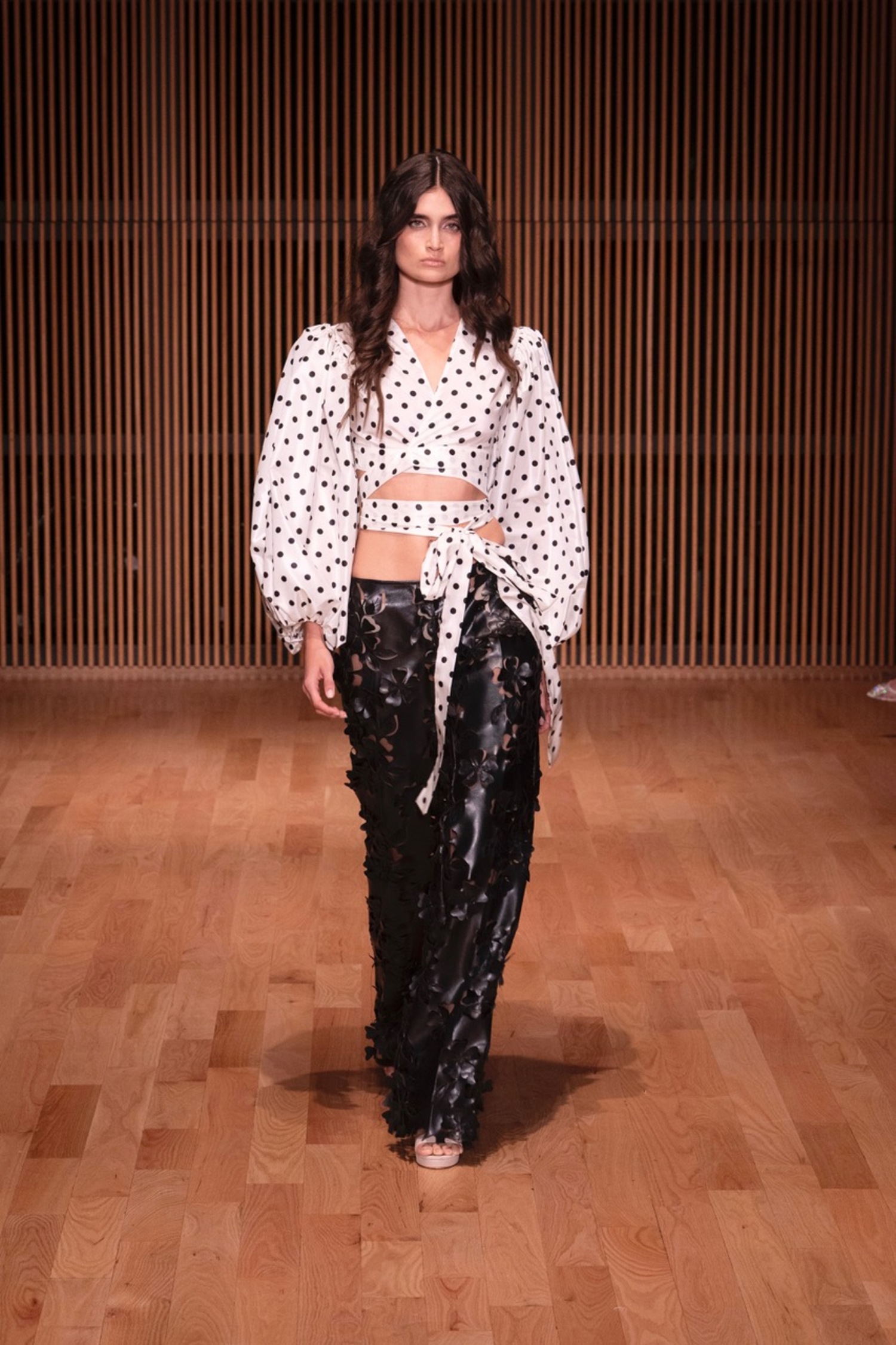 Frederick Anderson shows a polka dot top in his Spring 2026 Collection.