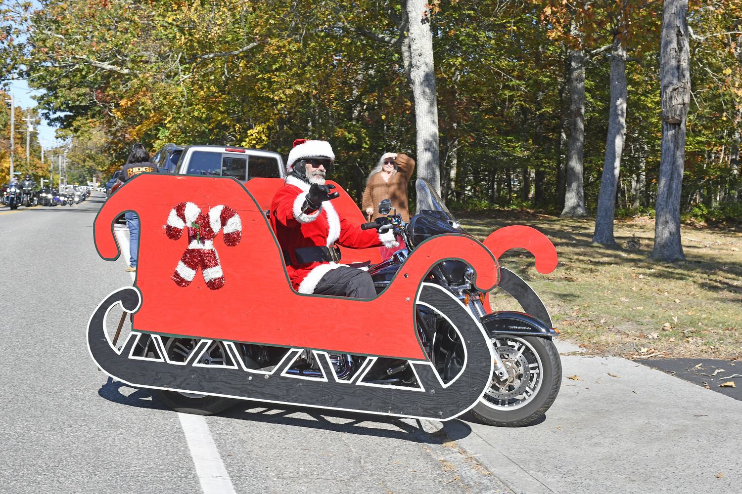 Herb Gilcher leads the pack as Santa at the 35th ABATE (American Bikers Aimed Toward Education)  annual Food and Toy Run to  St. Mary's Episcopal Church in Hampton Bays on Sunday  This is the 35th year for this event.  Over 170 bikers gathered  at the Elks Lodge in Riverhead proceeded to the church at bringing with them toys, non-perishable foods and other donations. St. Mary's, then disburses the items to local charitable organizations including Angel Tree Program of the Prison's Fellowship Ministry, The Retreat, children and families living on the Shinnecock Indian Reservation and local families in Hampton Bays.  DANA SHAW