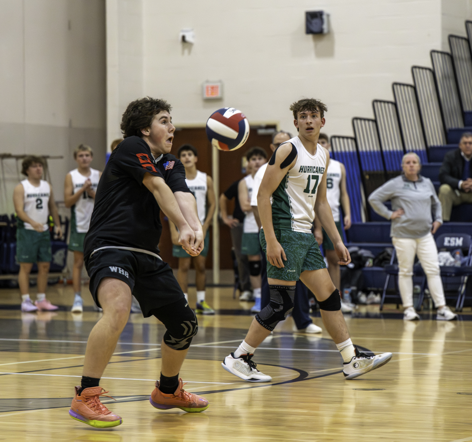 Junior libero Nolan Parsons digs out a serve return in the third set. MARIANNE BARNETT