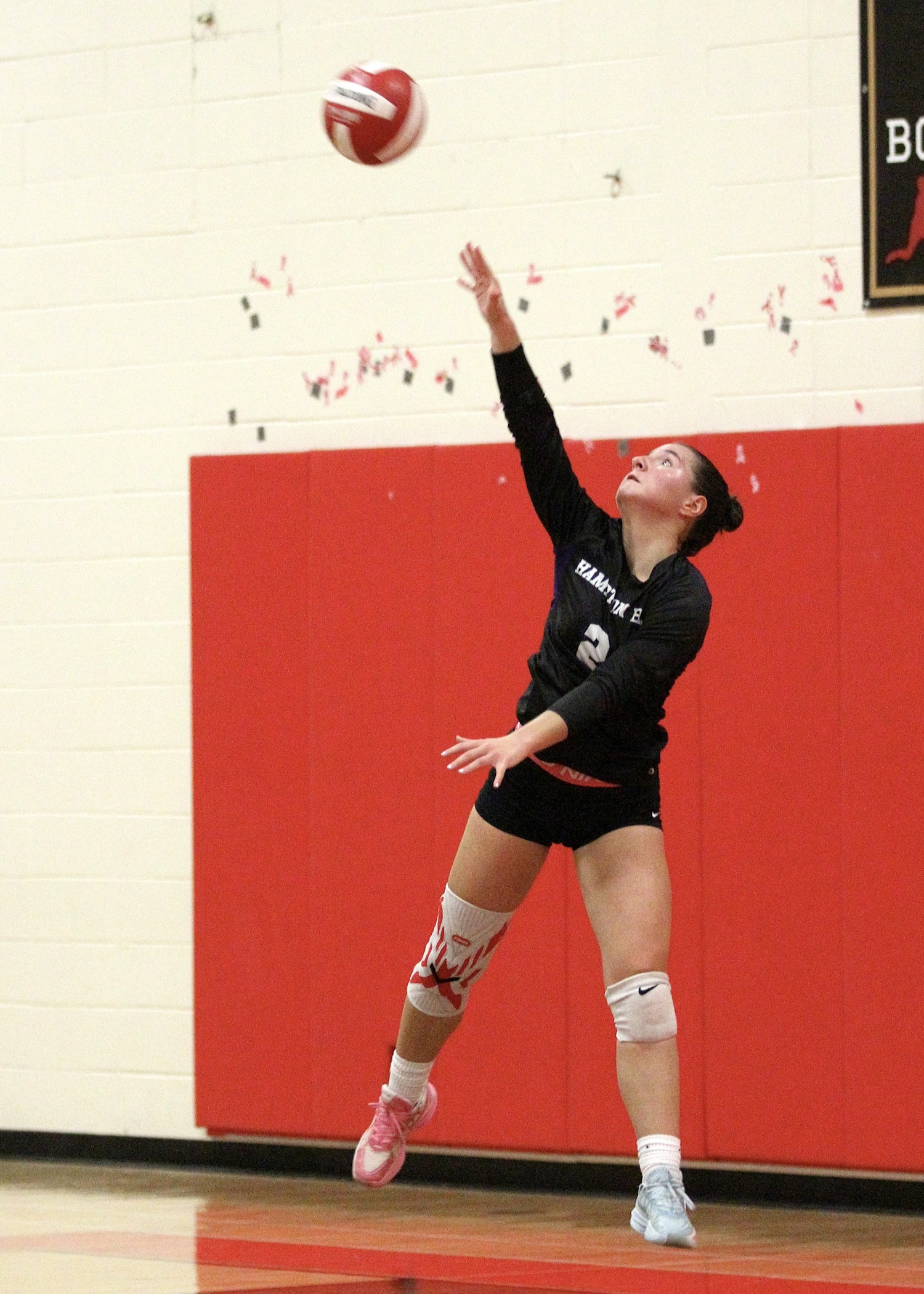 Senior outside hitter Madysen Frederiksen serves. DESIRÉE KEEGAN