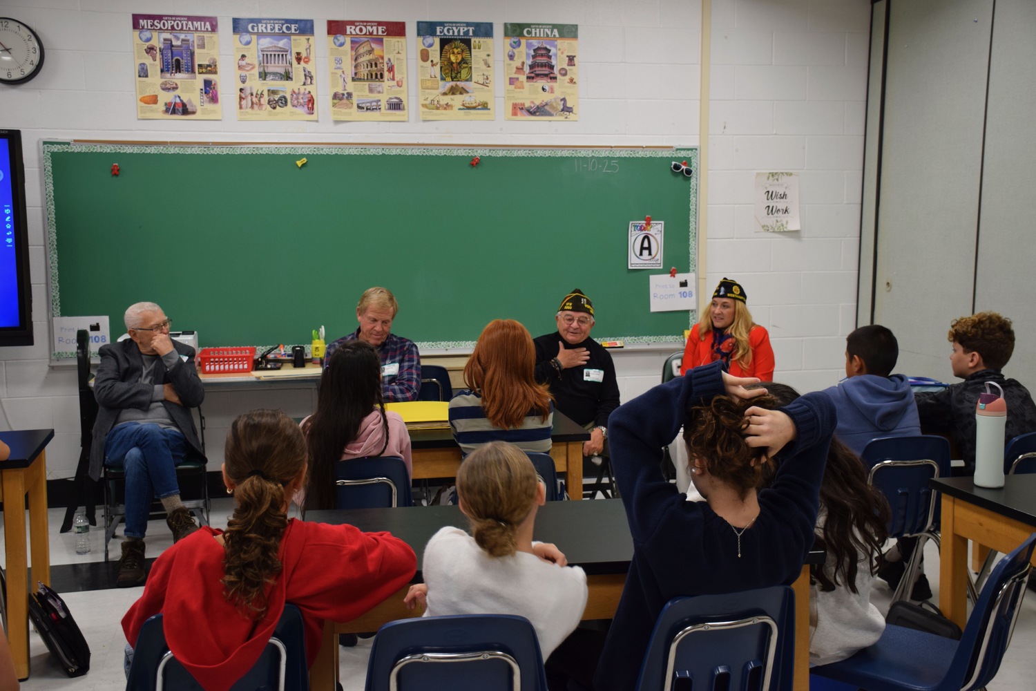 In recognition of Veterans Day, Westhampton Beach Middle School welcomed local veterans for a celebration recognizing their service and sacrifice. During the event, students met and spoke with veterans from various branches of the U.S. military. The guests shared personal stories, answered questions and offered insights into their experiences serving the country. COURTESY WESTHAMPTON BEACH SCHOOL DISTRICT