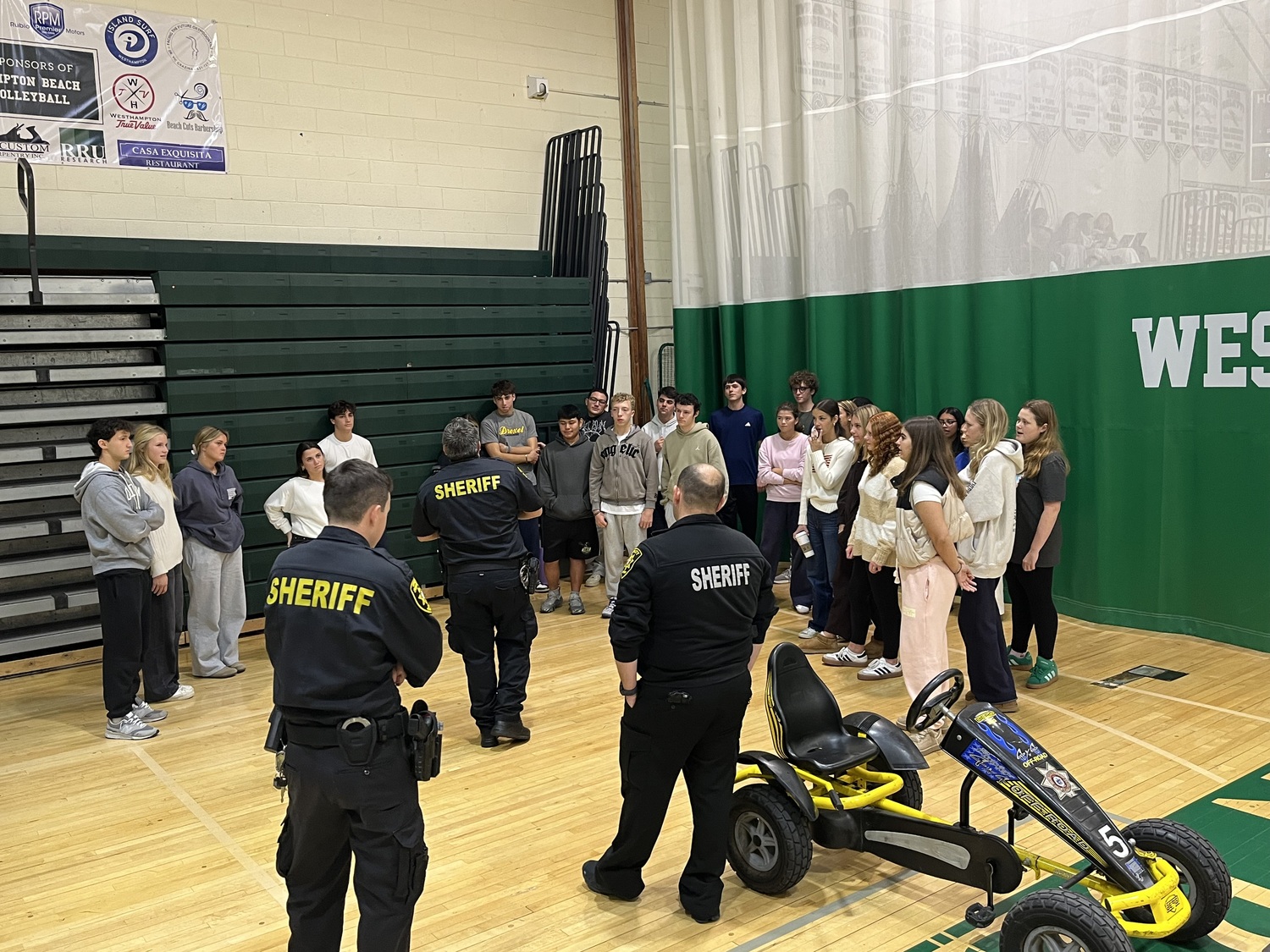 Westhampton Beach High School students participated in a series of engaging activities during Red Ribbon Week. As part of the week’s events, representatives from the Suffolk County Sheriff’s Office visited the school to facilitate a drunk driving simulation. The experience offered students a realistic and impactful look at the dangers and consequences of impaired driving. Also during the week, the school’s CURE Club hosted a can collection and recycling event and students wrote positive, drug-free messages on red paper strips during their English classes. The strips were then linked to form a long chain that is displayed in the high school library. COURTESY WESTHAMPTON BEACH SCHOOL DISTRICT