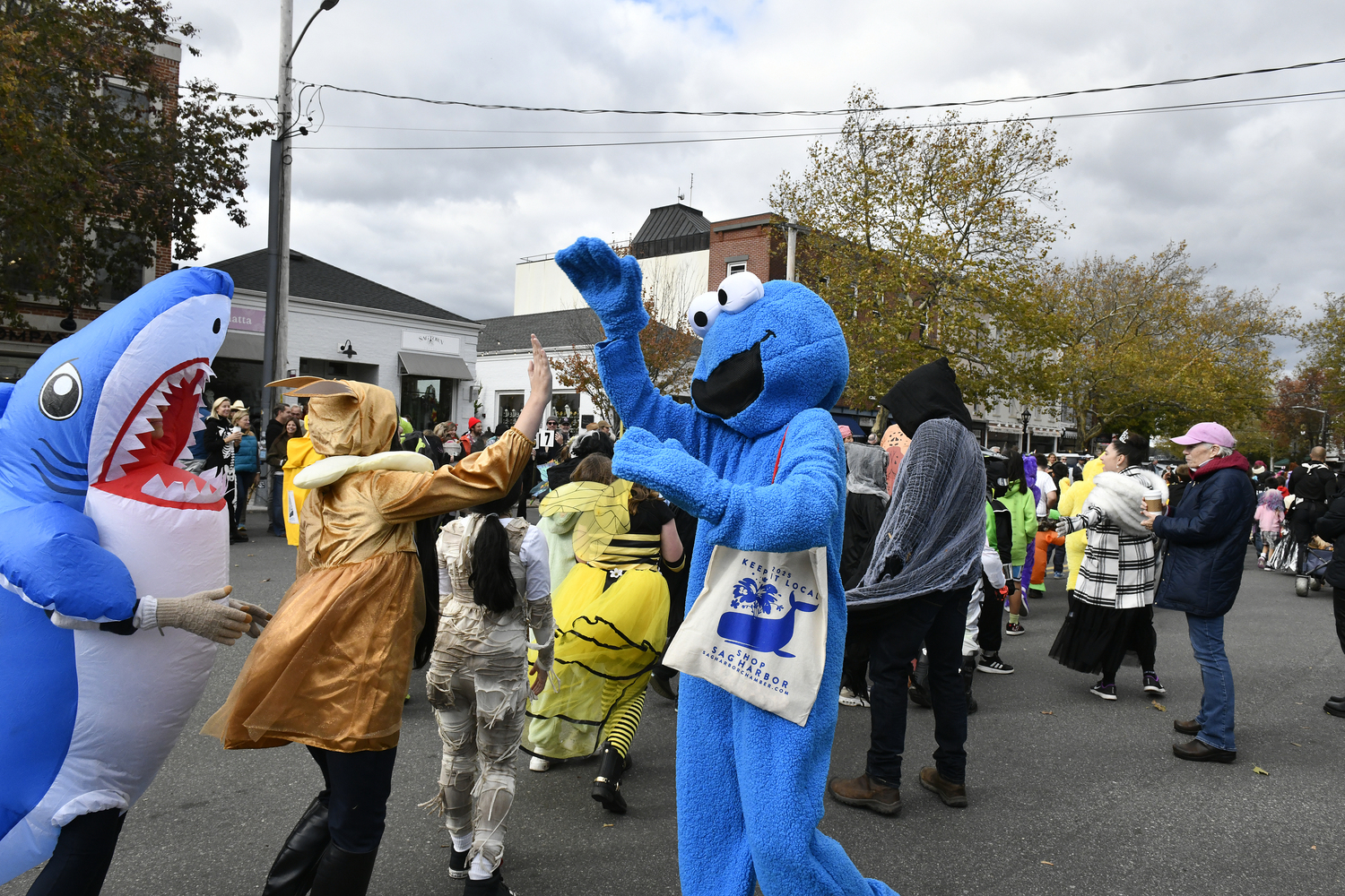 Sag Harbor Elementary students took to Main Street for the annual Halloween parade, greeting neighbors and local businesses along the way.   DANA SHAW