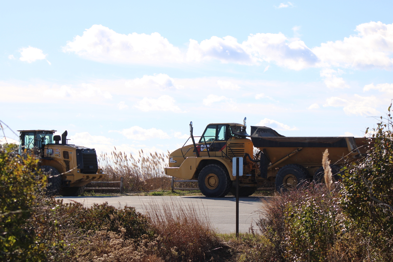 A truck sits in the parking lot, where the sand for the dune reconstruction awaited transport. JACK MOTZ