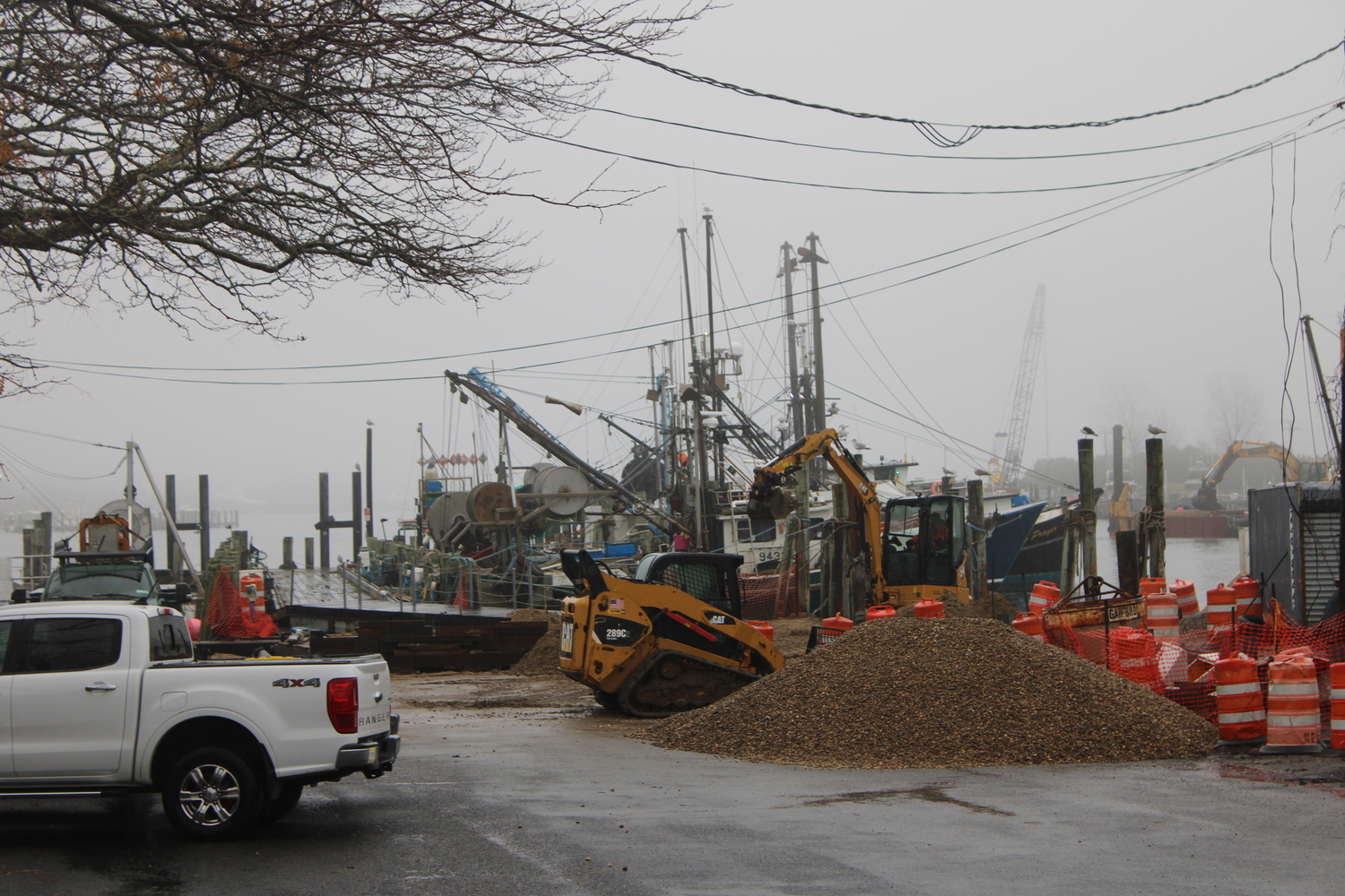 The Lake Montauk Inlet dredging isn't the only work going on down at the commercial docks in Montauk. East Hampton Town is repairing the town-owned fishing docks as part of a $2 million project. This has been ongoing for about a month. JACK MOTZ