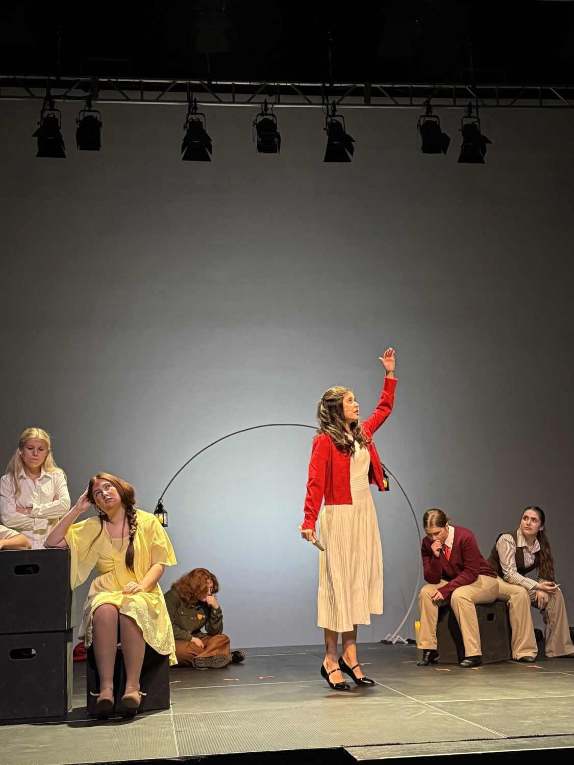 Hannah Pak, (center) a senior at Southampton High School, is playing Alice in South Fork Performing Arts' production of Alice By Heart.