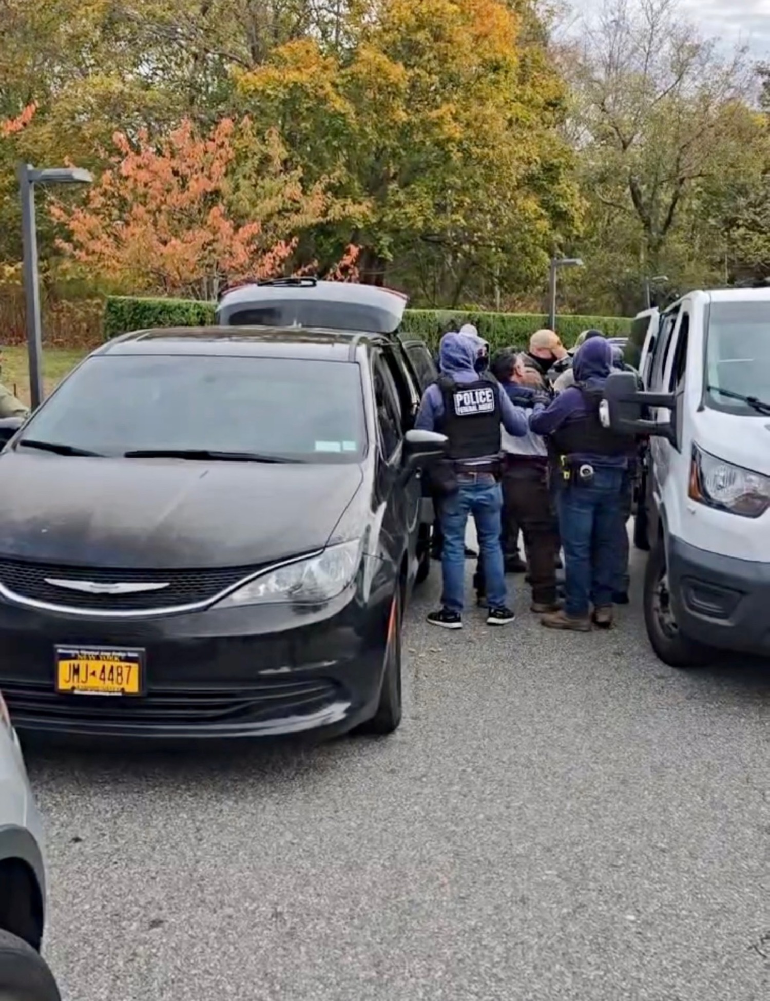 At least seven people were detained, four in Hampton Bays and three in Westhampton Beach during the operation, which lasted several hours on Wednesday morning. One of the men detained told onlookers that his name is Agustin Velasquez before being hauled away.
