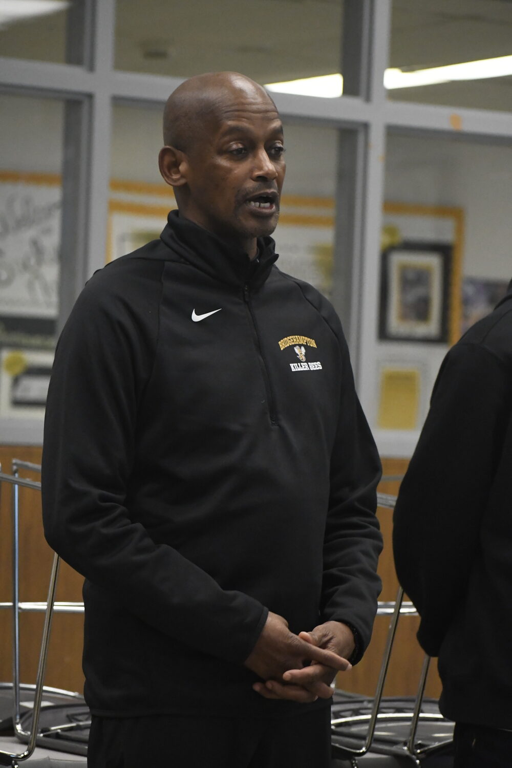 Bridgehampton head coach Carl Johnson speaks during the first-ever Suffolk Boys and Girls Basketball Coaches Association Media Day that was held at Sachem North High School on November 22.  DREW BUDD
