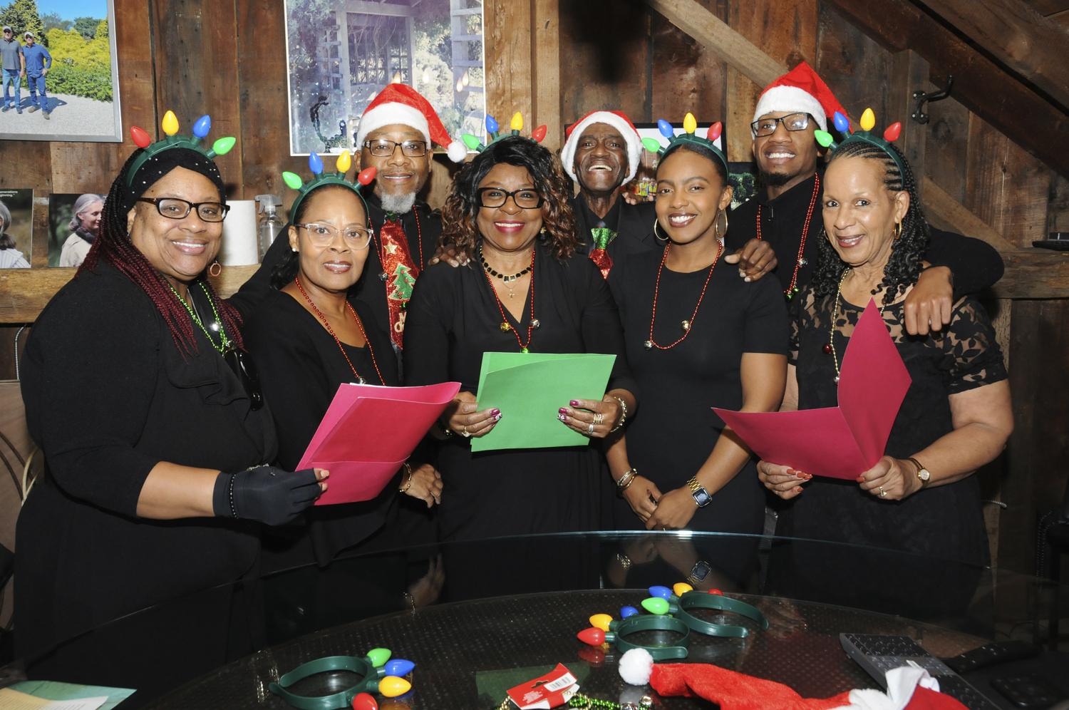 The Genesis Ensemble: Shelly Robinson, Aleta Parker, Elder Melvin Robinson, Theressa King, Deacon Kent Brown, Alaya Brown, Baase Gilbertand, Joanne Brown performed at the 49th annual holiday open house at Marders in Bridgehampton on Sunday. RICHARD LEWIN