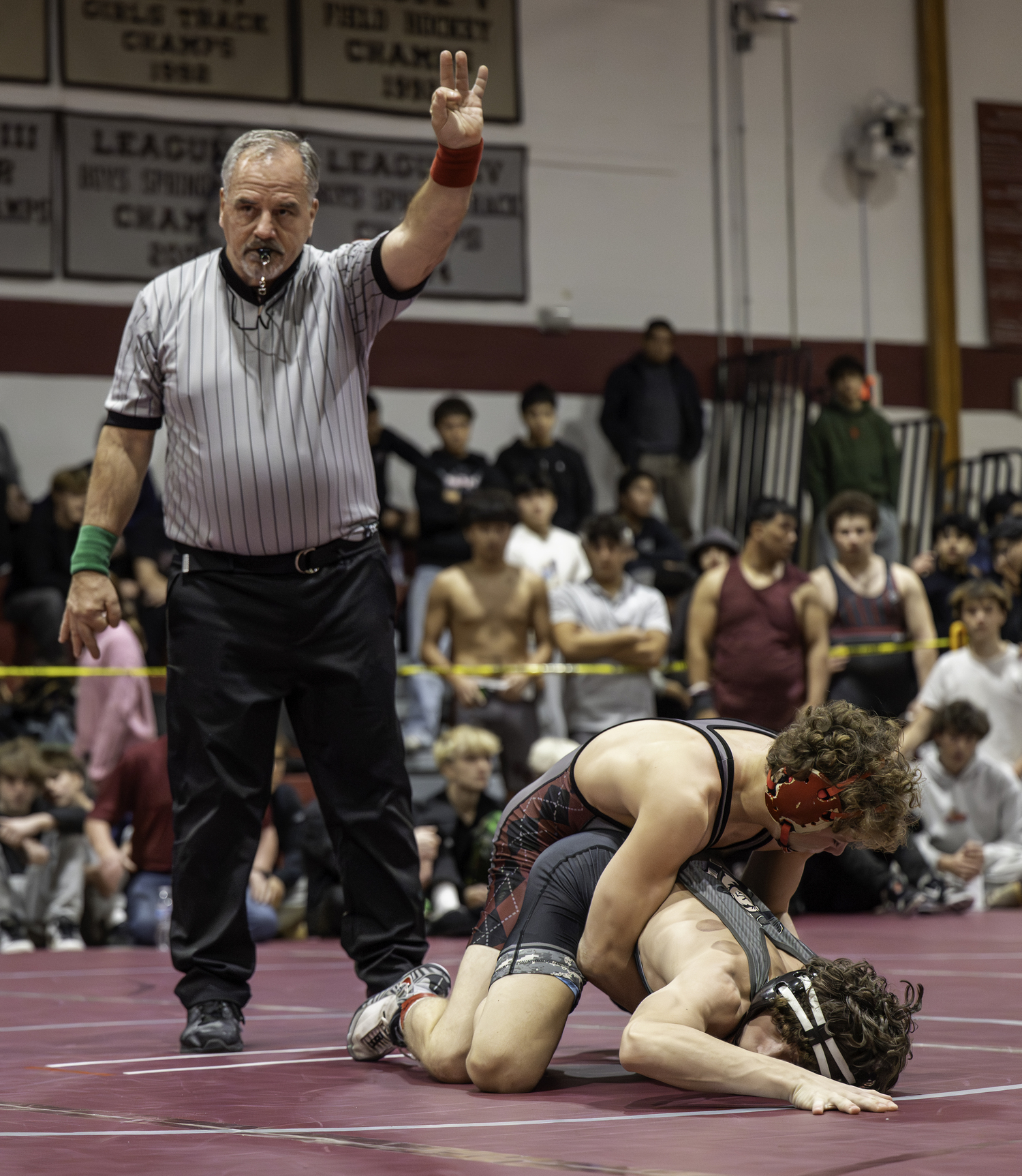 Bronco Campsey scores three points in his finals match against Ward Melville's Nick Barone.  MARIANNE BARNETT