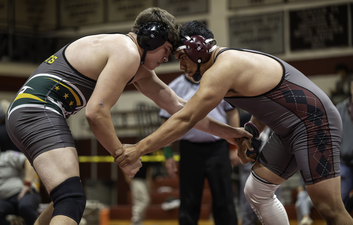 East Hampton senior Juan Espinoza competing against a Ward Melville opponent in the semifinals on Saturday.  MARIANNE BARNETT