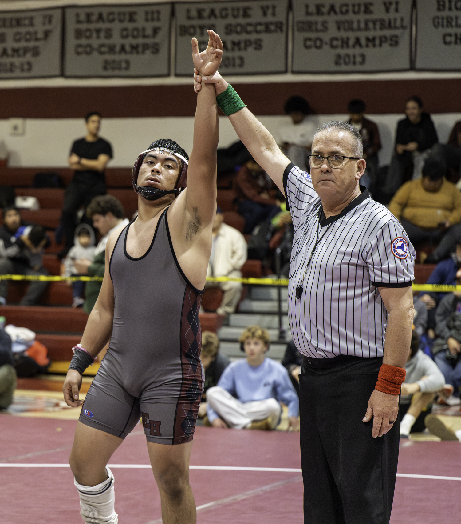 Juan Espinoza gets his arm raised.  MARIANNE BARNETT