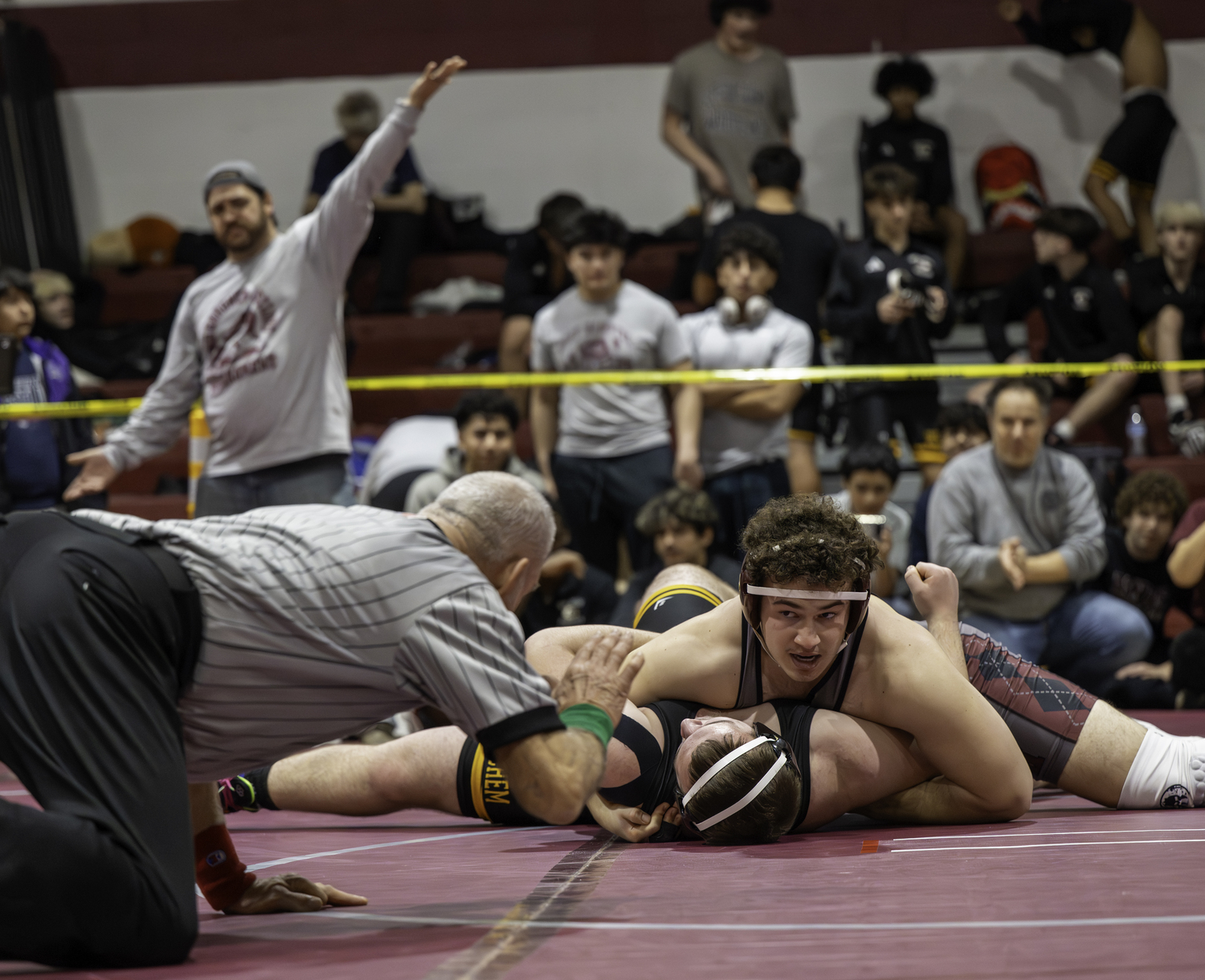 East Hampton senior Franco Palombino pinned  Sachem North’s Giovanni Avila to win the 285-pound weight class on Saturday.  MARIANNE BARNETT