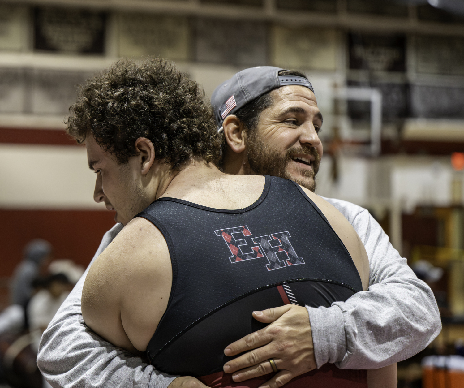 Franco Palombino and assistant coach Cory Strain after his big win.  MARIANNE BARNETT