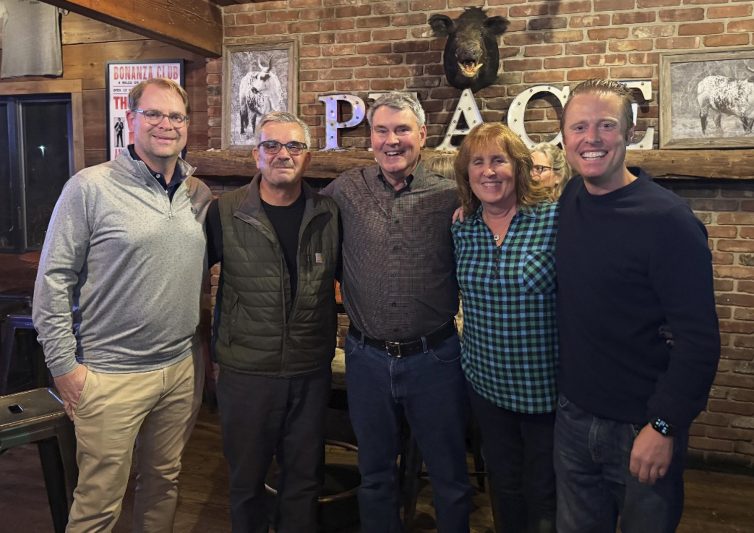 Billy Hajek, Tom Preiato, Ken Collum, Linda Beyer and Rob Jahoda at the recent retirement party celebrating her 20 years at the East Hampton Village Building Department for Ms. Byers at Town Line BBQ.  RICVHARD LEWIN