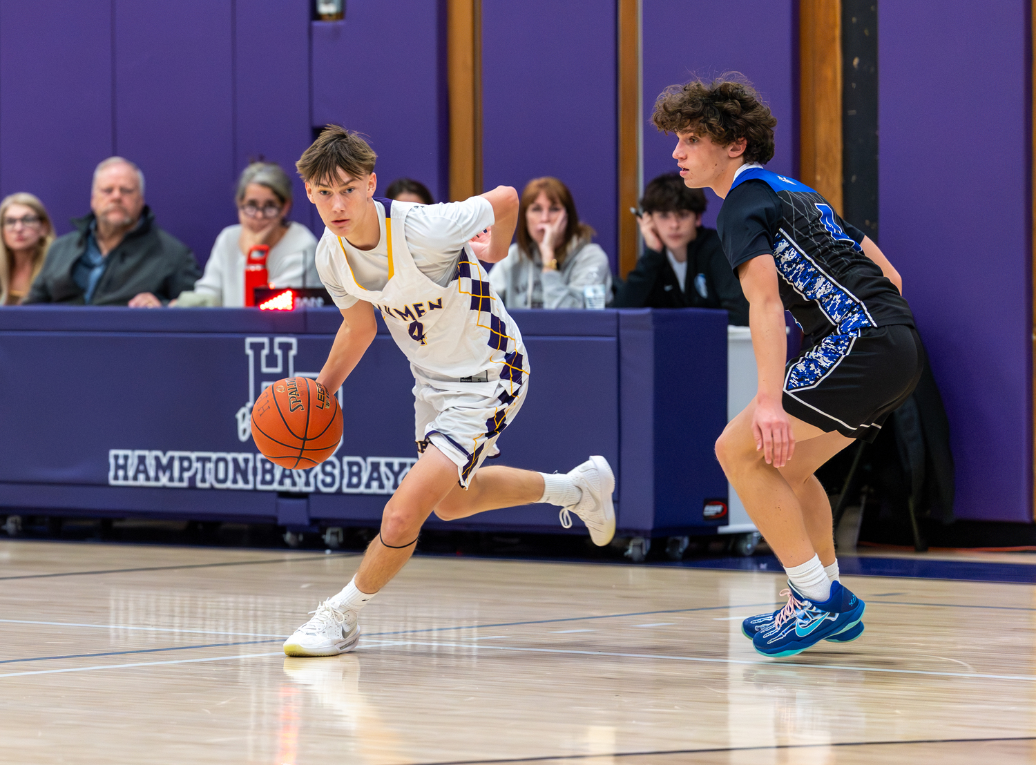 Hampton Bays junior Kyle Gorman keeps his eyes up court as he dribbles with the ball.  RON ESPOSITO
