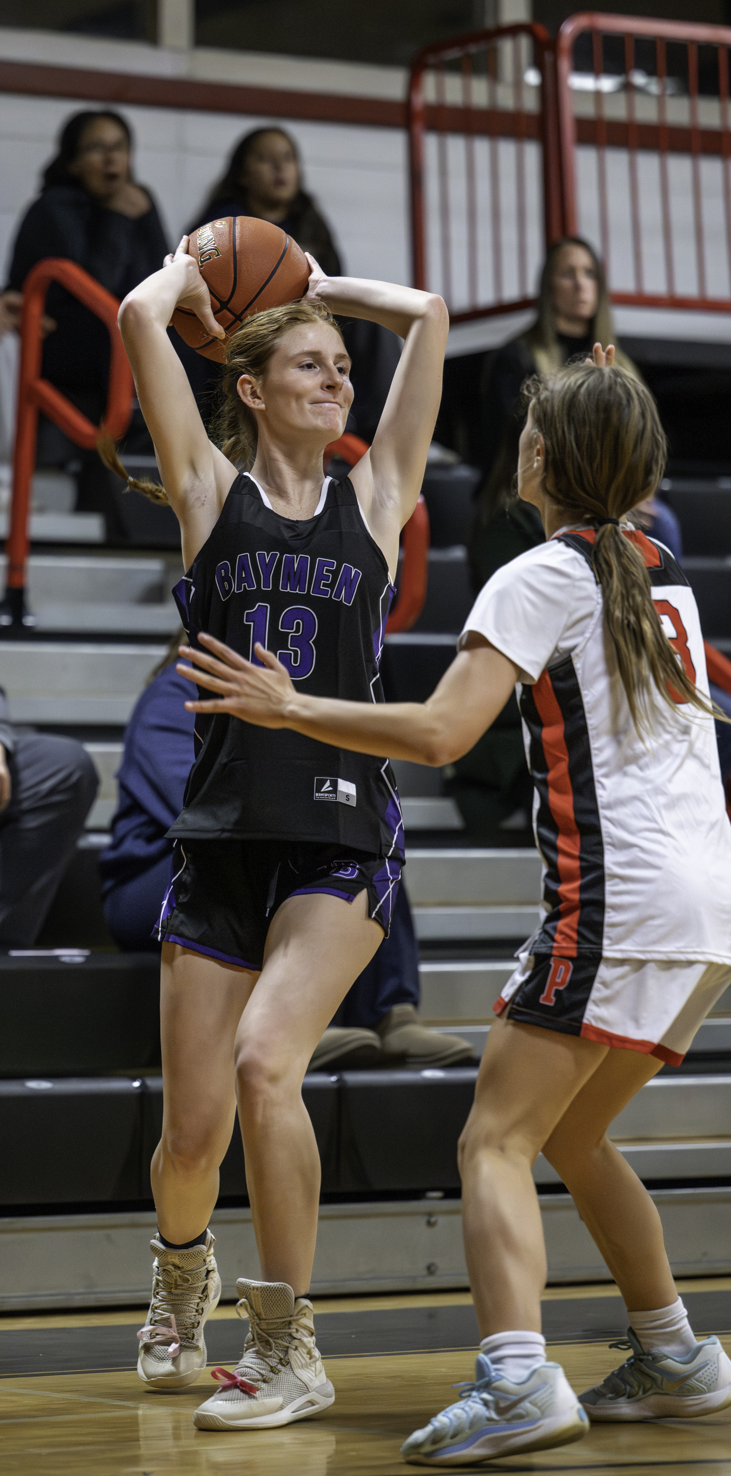 Hampton Bays senior Shea Egan looks for an open teammate.  MARIANNE BARNETT