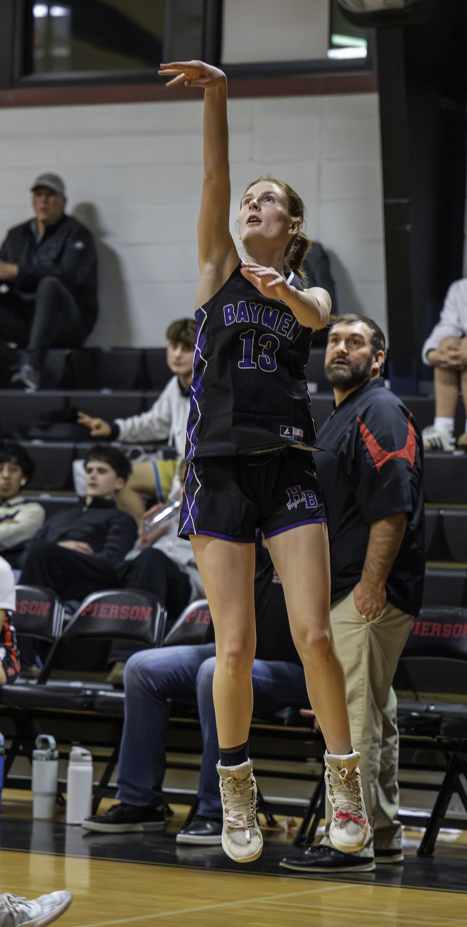Hampton Bays senior Shea Egan spots up a three-pointer.  MARIANNE BARNETT