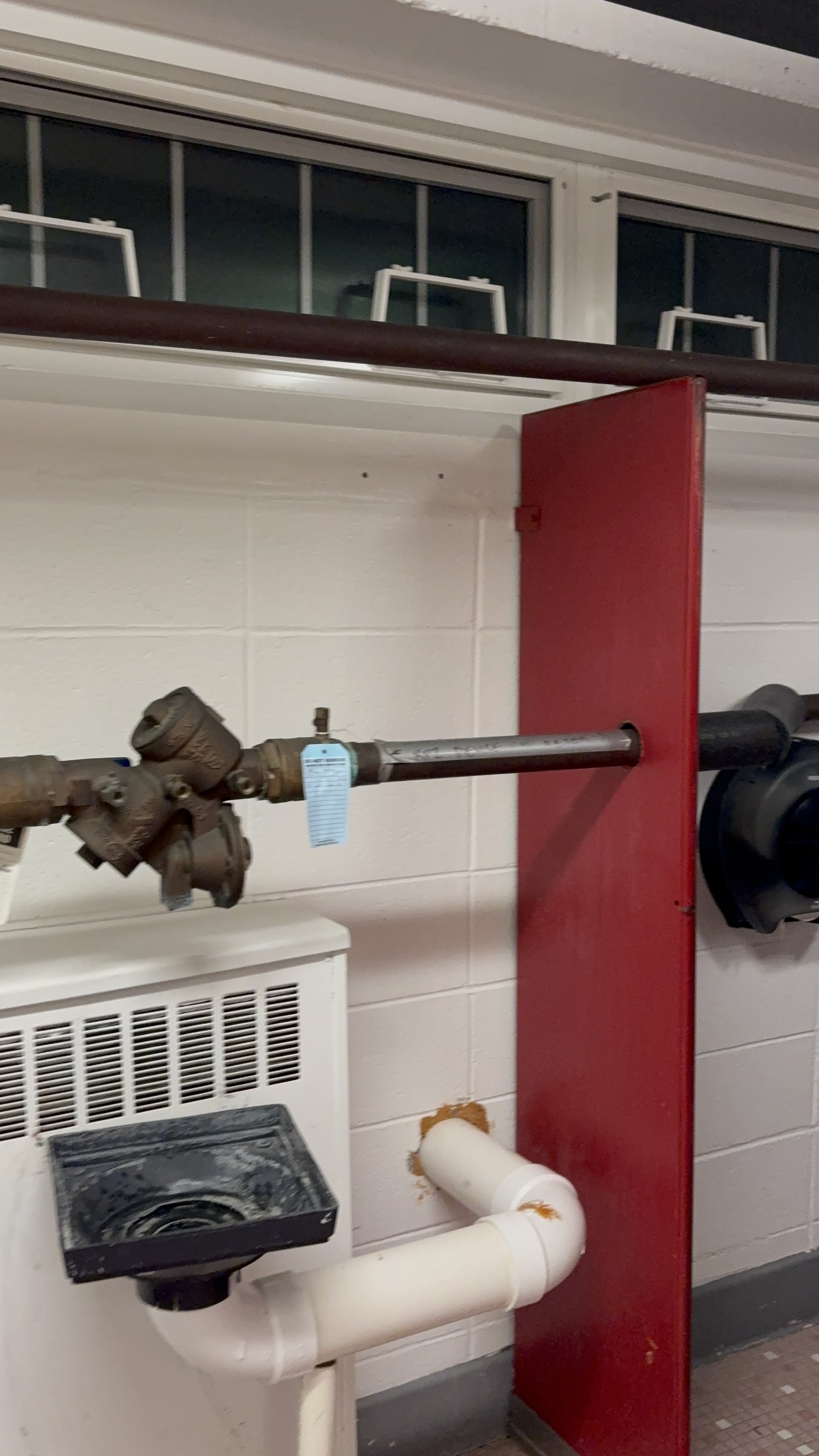 Exposed pipes exist throughout the locker rooms. CAILIN RILEY