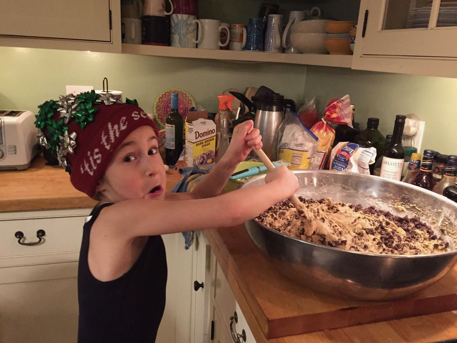 A young Carlee Kenny making a fresh batch of cookies for the holiday season. Having children pitch in on the holiday planning can remove some of the stress of doing it all yourself.