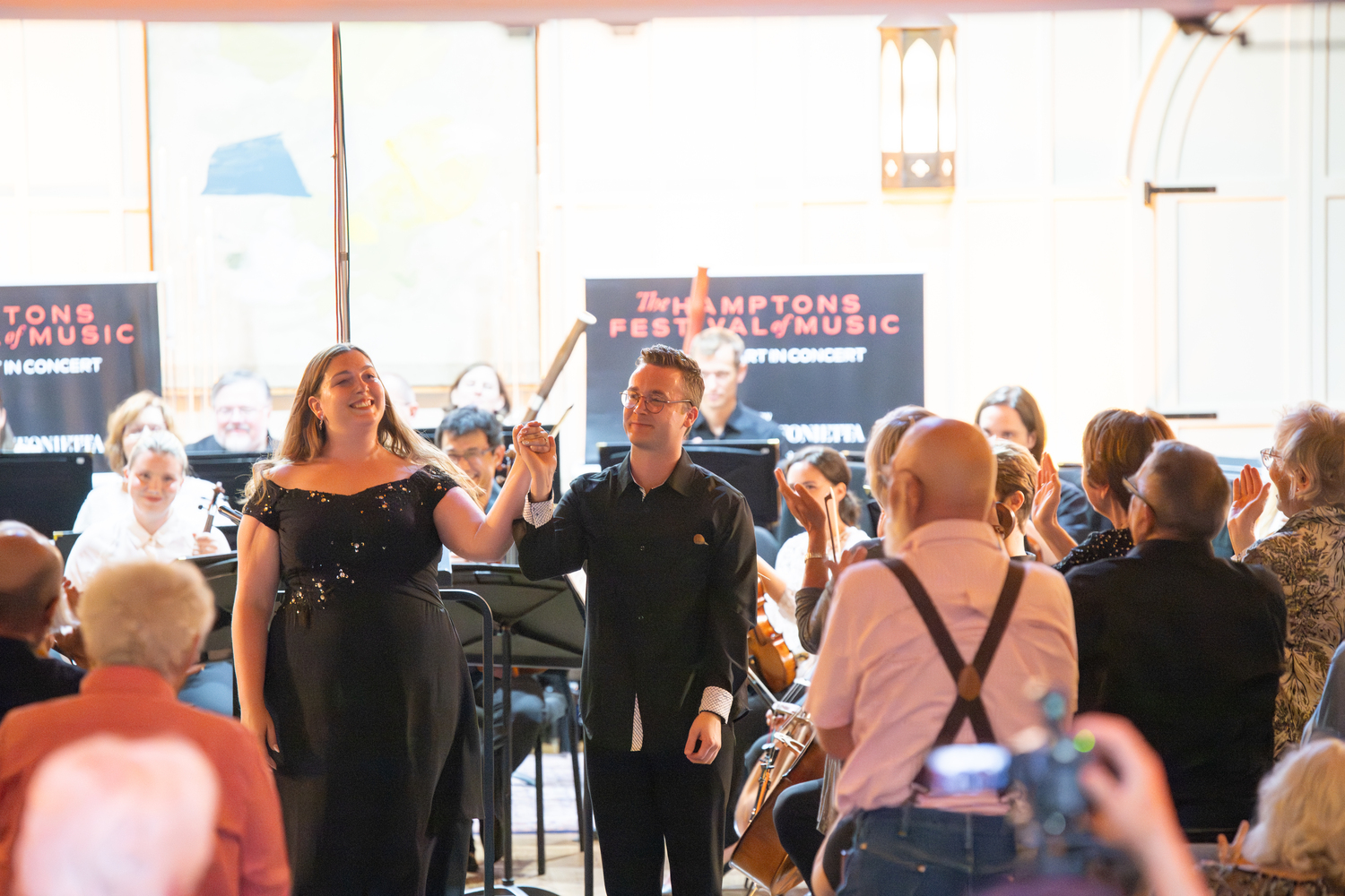 Soprano Greer Lyle and TH·FM associate conductor Logan Souther performing in a previous concert at St. Luke's Hoie Hall. DANE DUPUIS