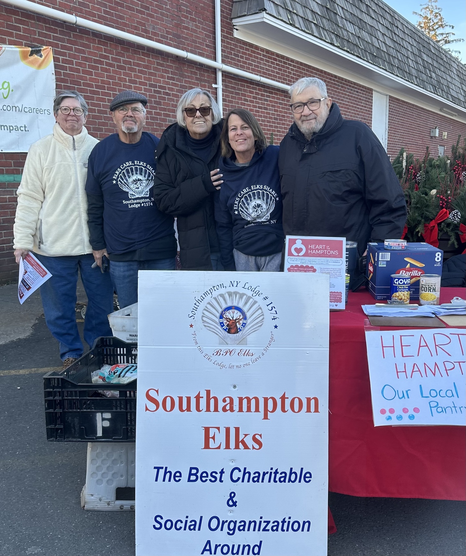 Southampton Elks Lodge #1574 recently held a community food drive in support of Heart of The Hamptons, which offers food assistance to more than 3,200 local households each year.  Through generous donations from the community and members of the lodge, the Elks delivered a substantial amount of nonperishable food to the pantry. A large donation came from fashion designer and QVC regular Dennis Basso, who filled an entire car with five grocery bags with food. Volunteers included, from left, Diane Scanlon, Fred Kirst,
Carol Kierych, Mary Hunt and Gene Scanlon. COURTESY SOUTHAMPTON ELKS LODGE