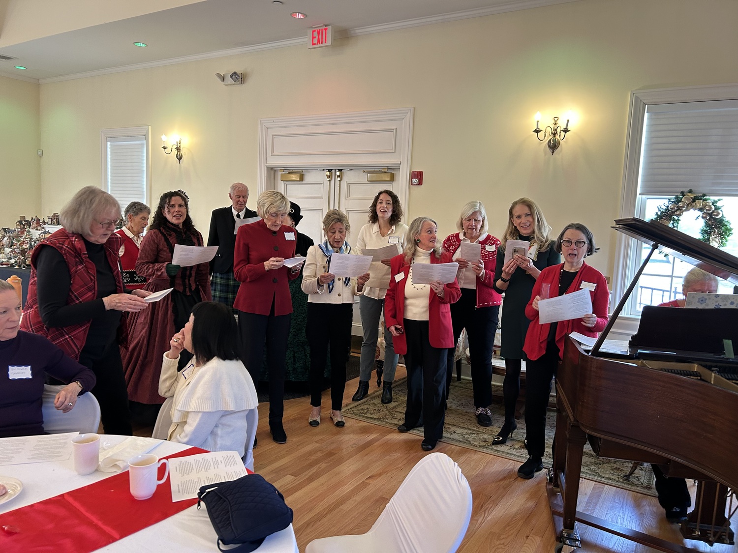 The Westhampton Woman’s Club recently hosted a holiday tea and members brought supermarket gift cards that will be donated to those in need. COURTESY TOM HADLOCK